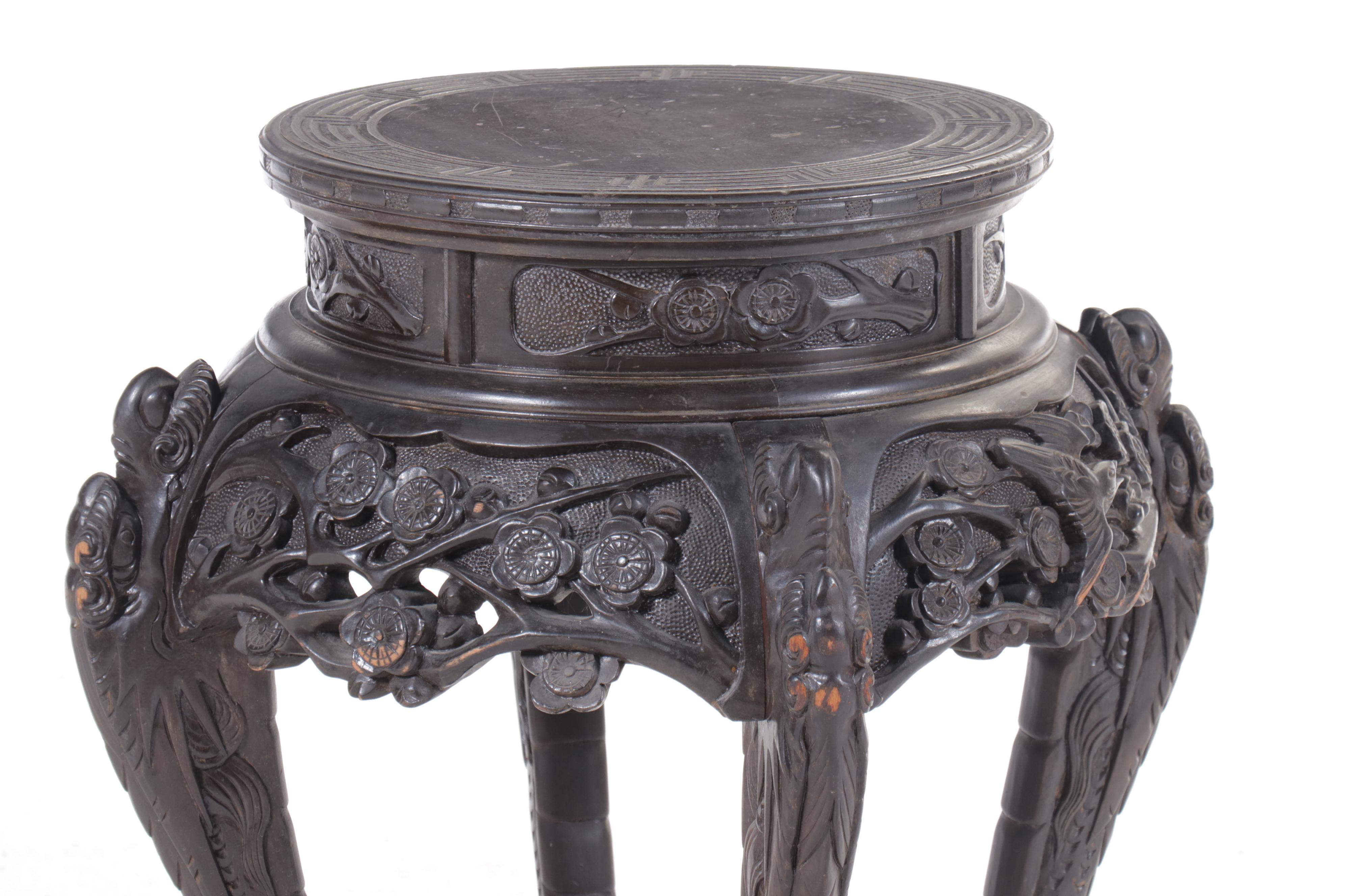 Chinese Ornately Carved Ebonized Wood Stand