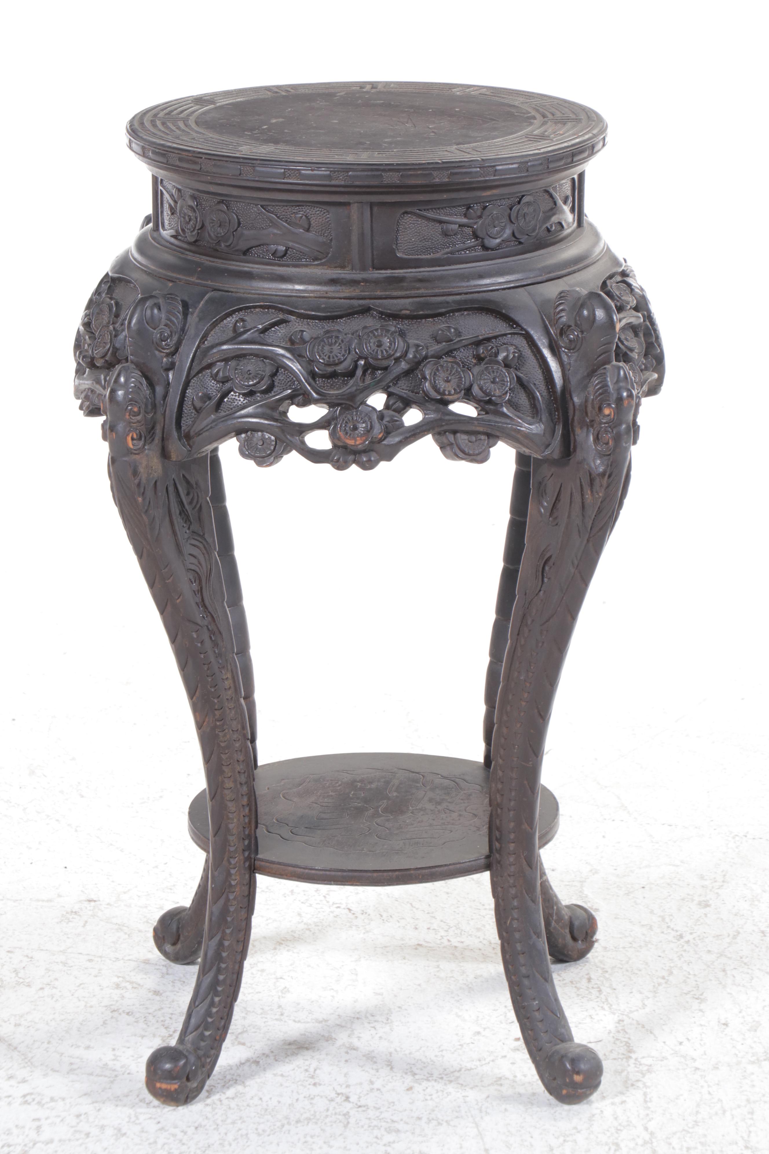 Chinese Ornately Carved Ebonized Wood Stand