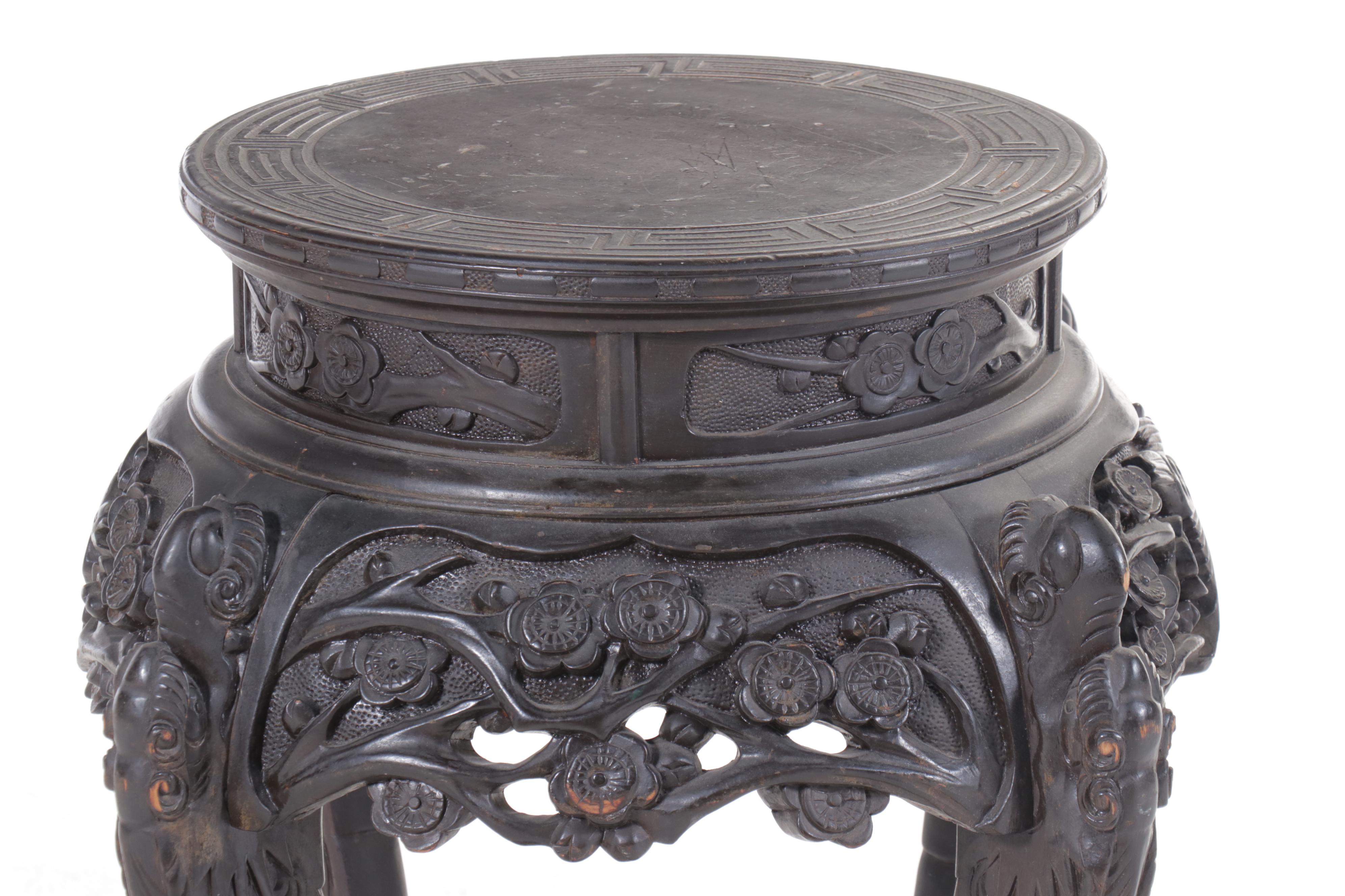 Chinese Ornately Carved Ebonized Wood Stand