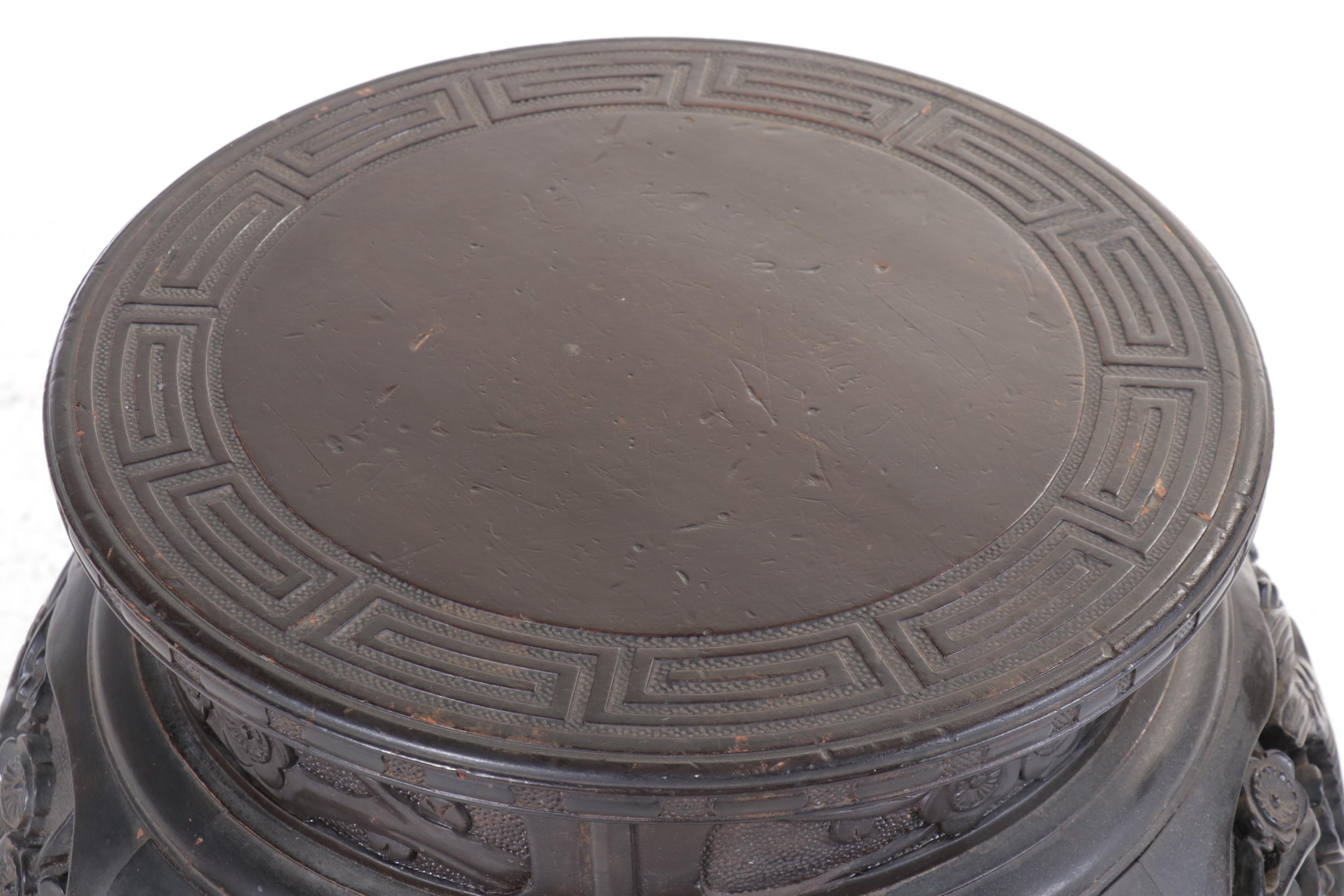 Chinese Ornately Carved Ebonized Wood Stand