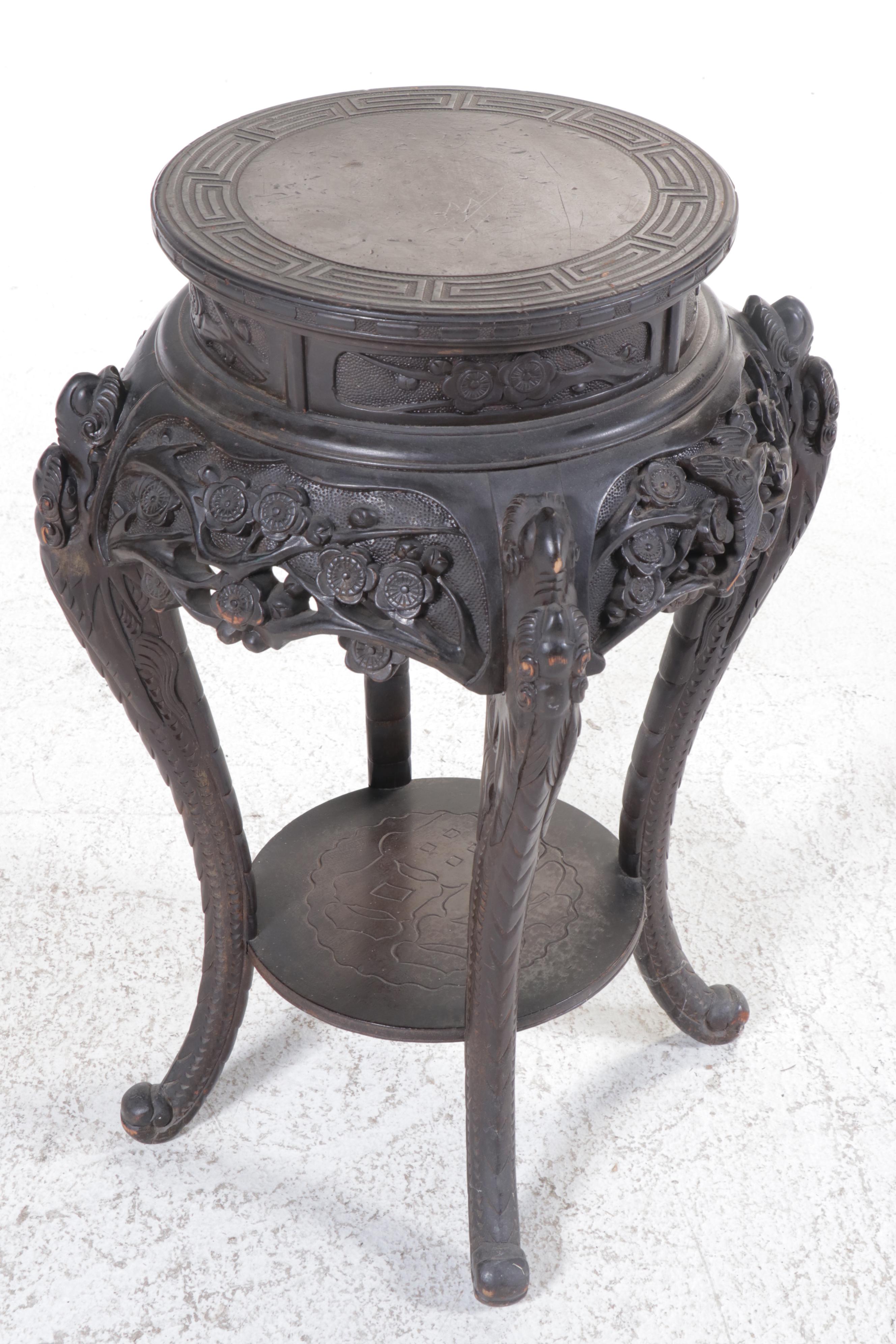 Chinese Ornately Carved Ebonized Wood Stand