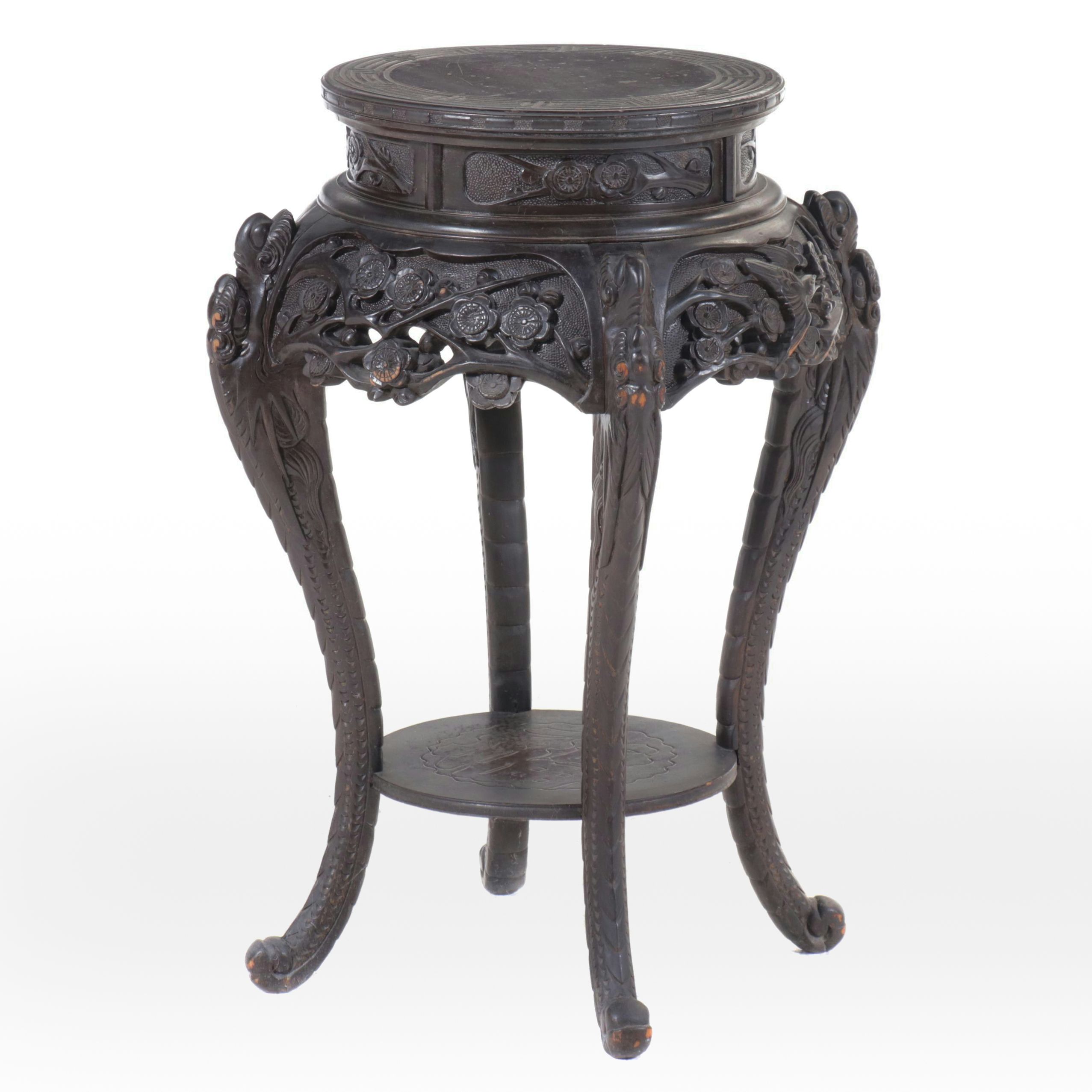 Chinese Ornately Carved Ebonized Wood Stand