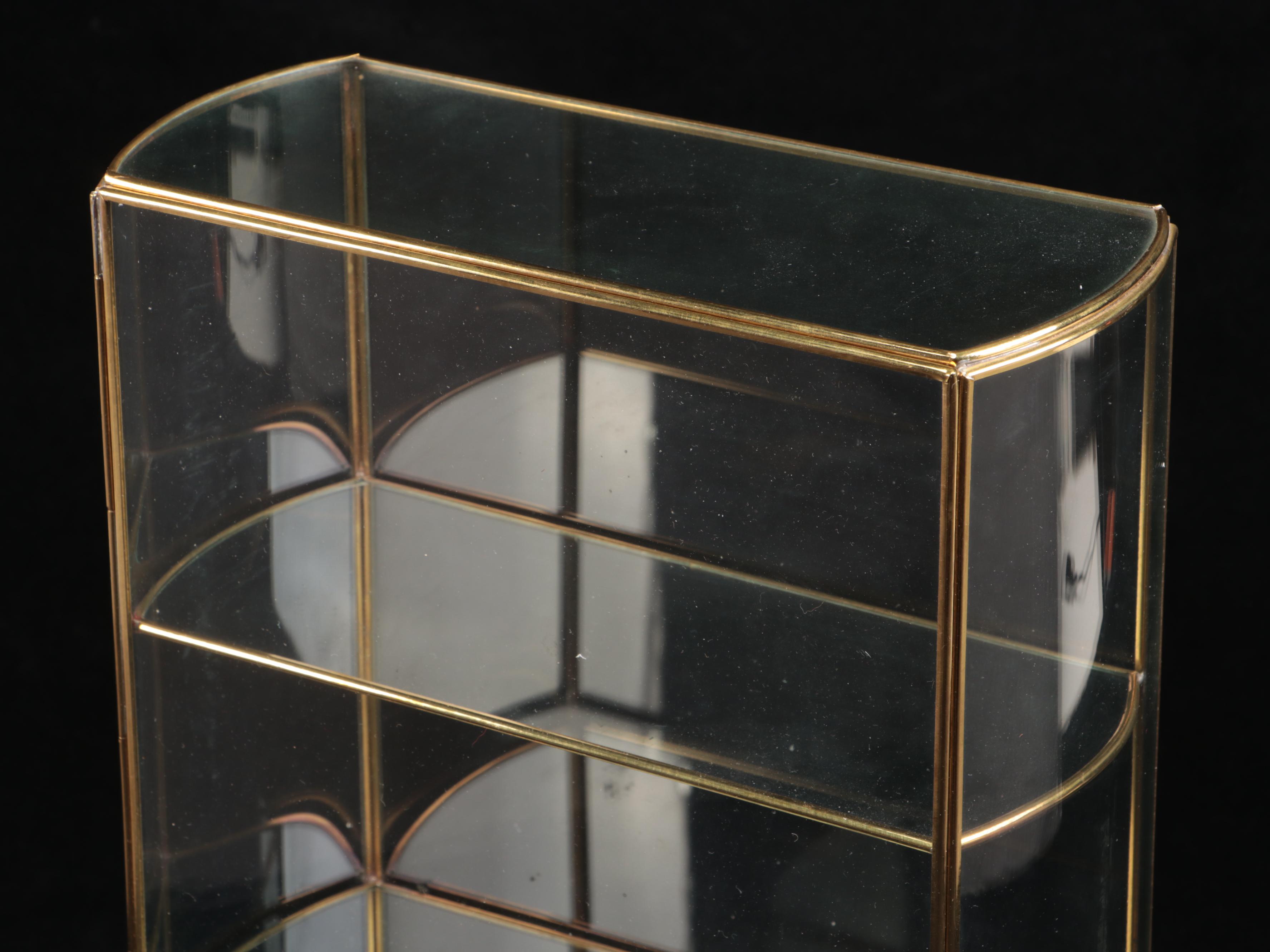 Brass Finish and Glass Decorative Shelving