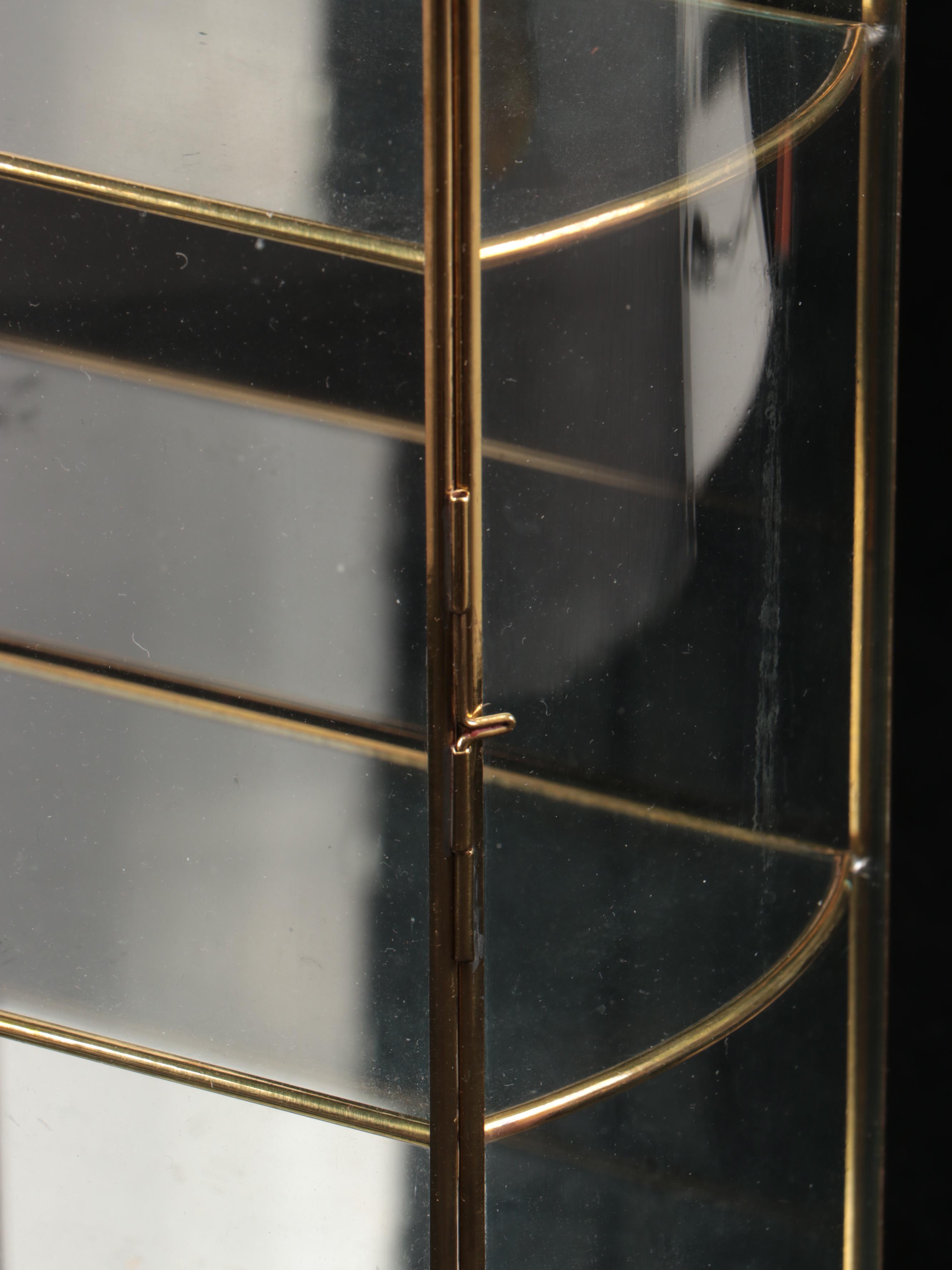 Brass Finish and Glass Decorative Shelving