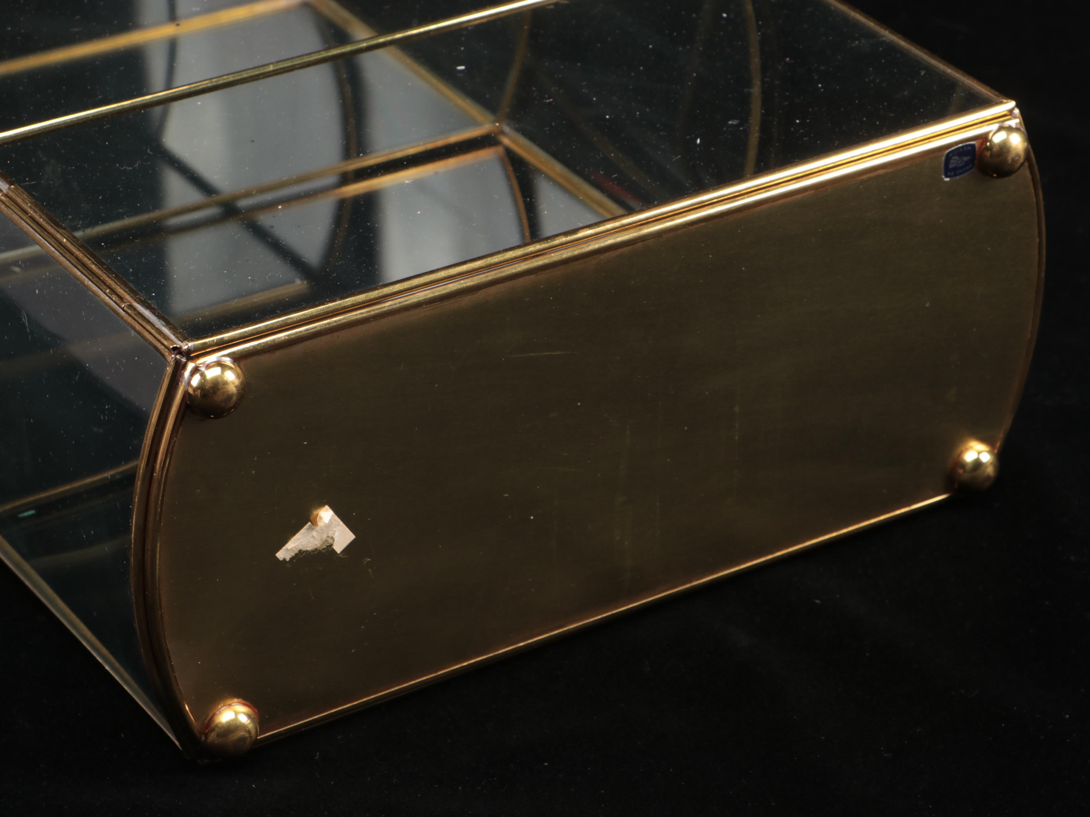 Brass Finish and Glass Decorative Shelving