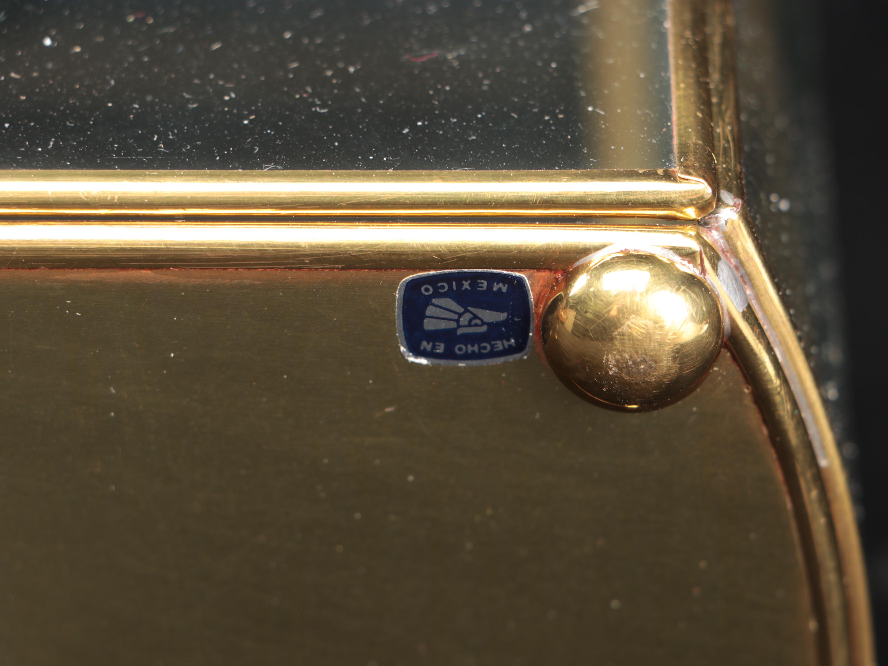 Brass Finish and Glass Decorative Shelving