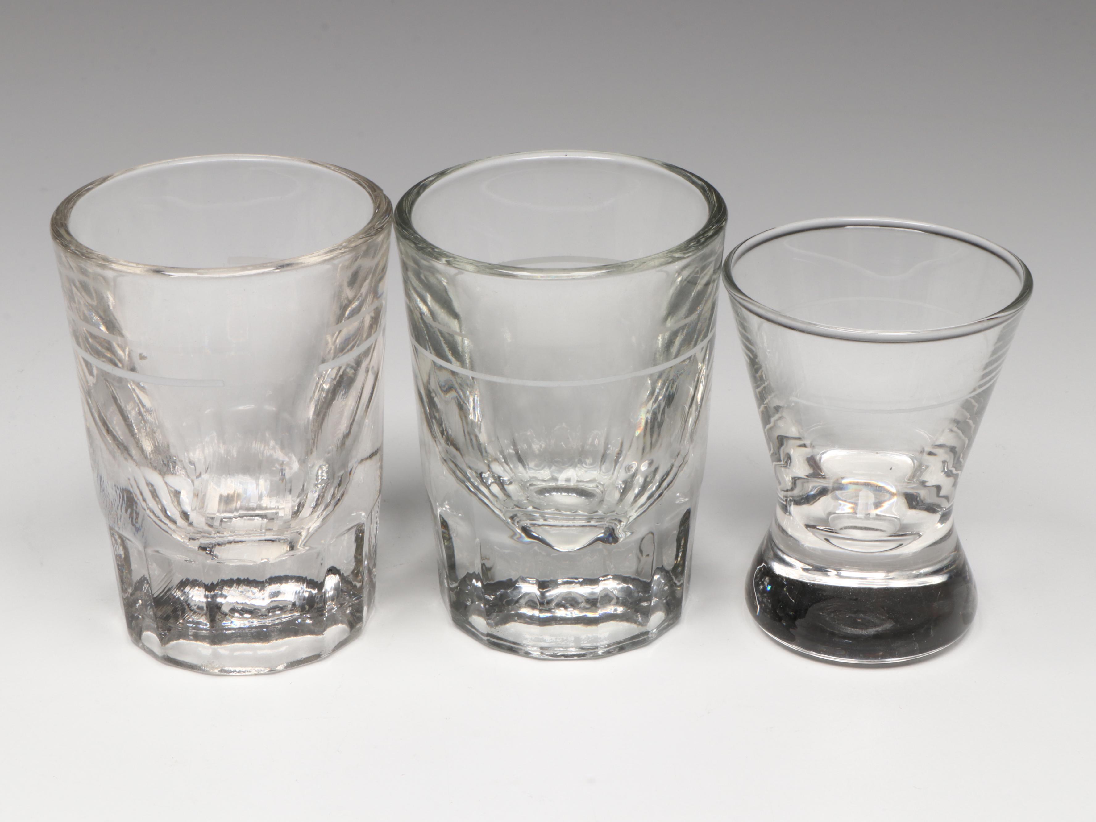 Flask with Leather Pouch and Souvenir and Other Shot Glasses