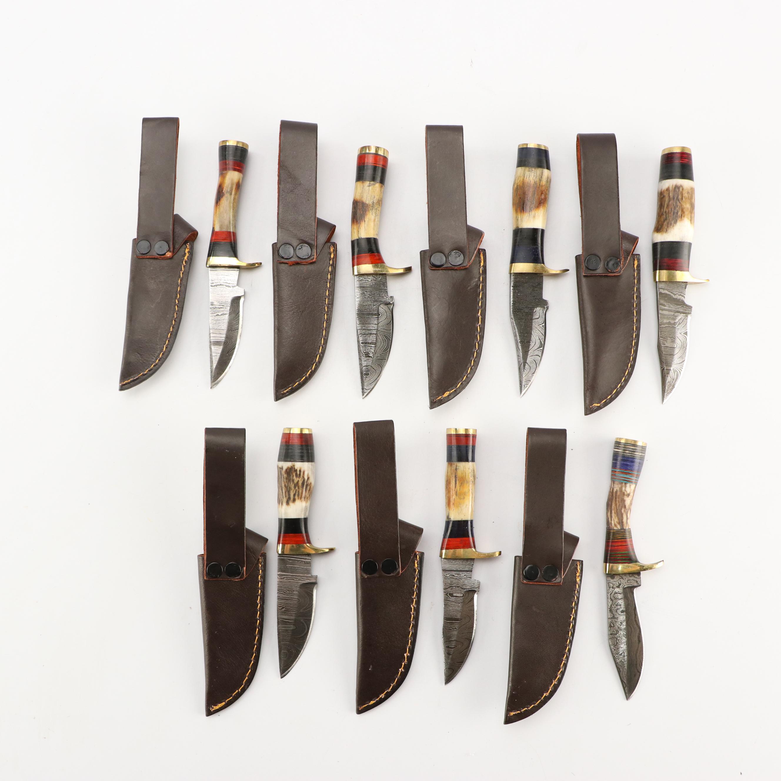 Damascus Steel and Antler Handled Skinner Knives in Leather Scabbards