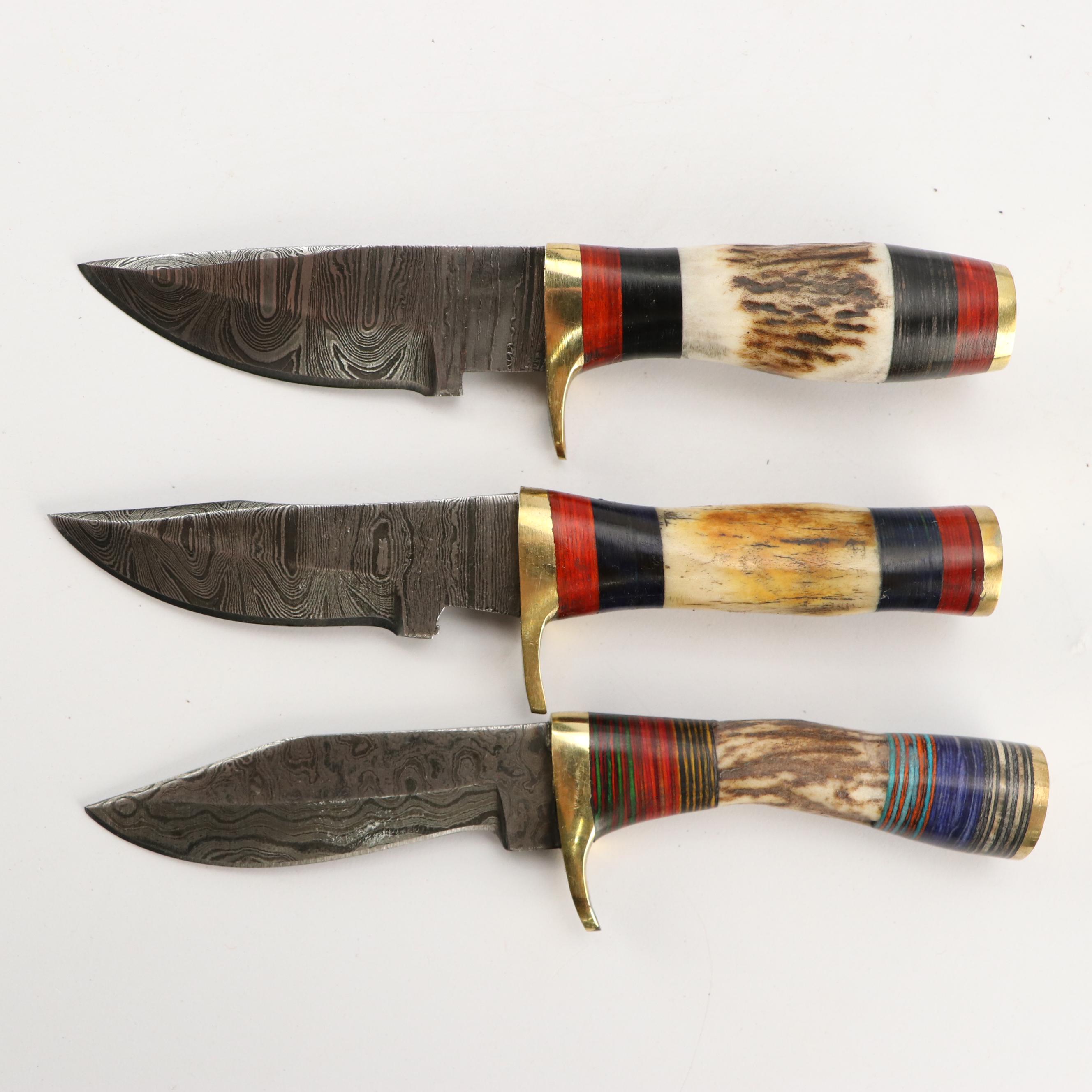 Damascus Steel and Antler Handled Skinner Knives in Leather Scabbards
