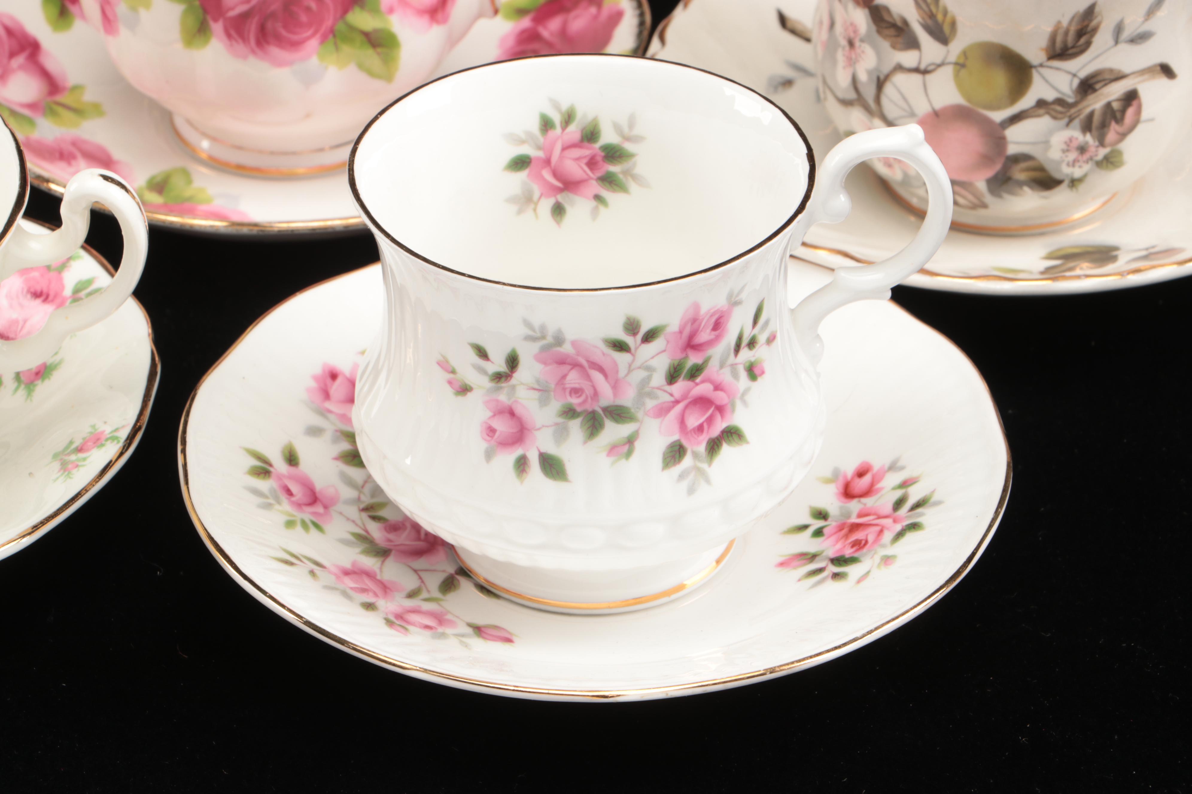 Vintage Floral Pattern Teacups with Saucers and Other Table Accessories
