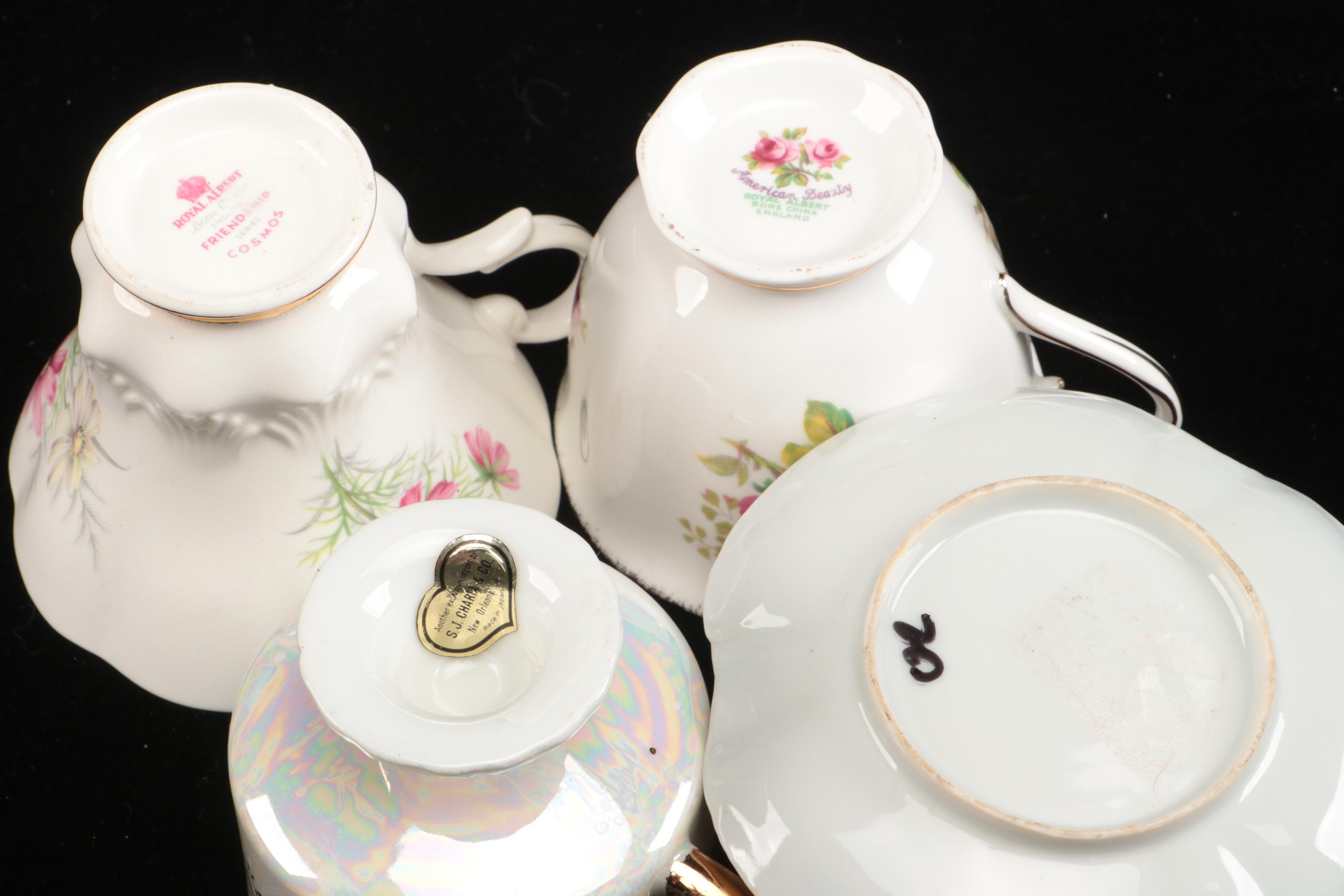 Vintage Floral Pattern Teacups with Saucers and Other Table Accessories