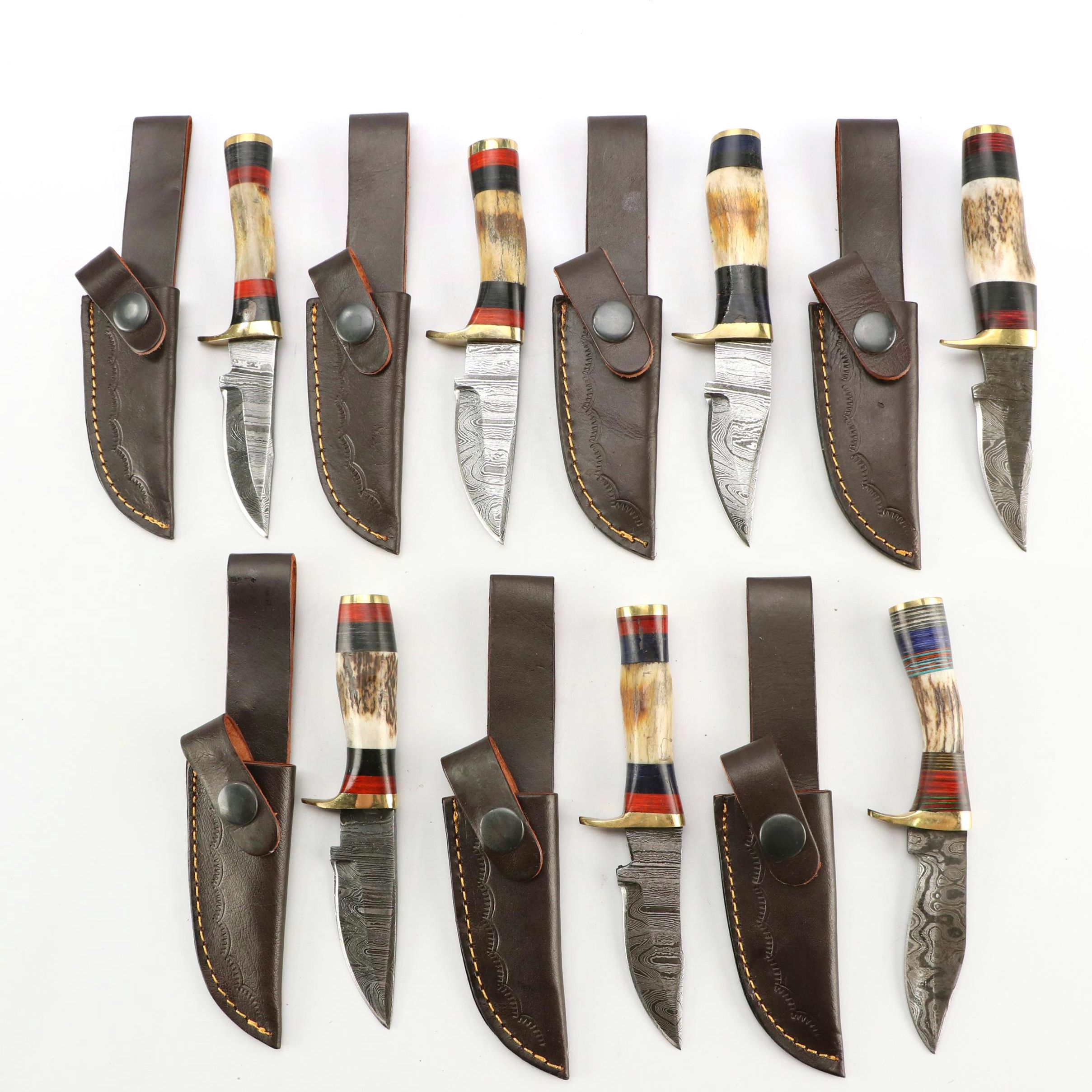 Damascus Steel and Antler Handled Skinner Knives in Leather Scabbards