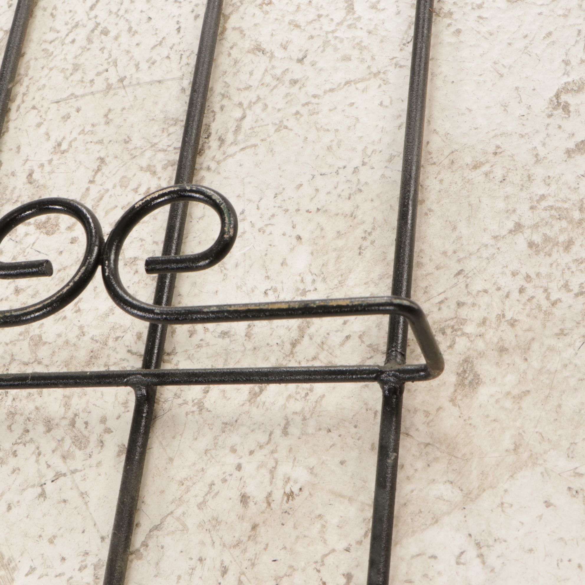 Three Wrought Iron Plate Display Racks