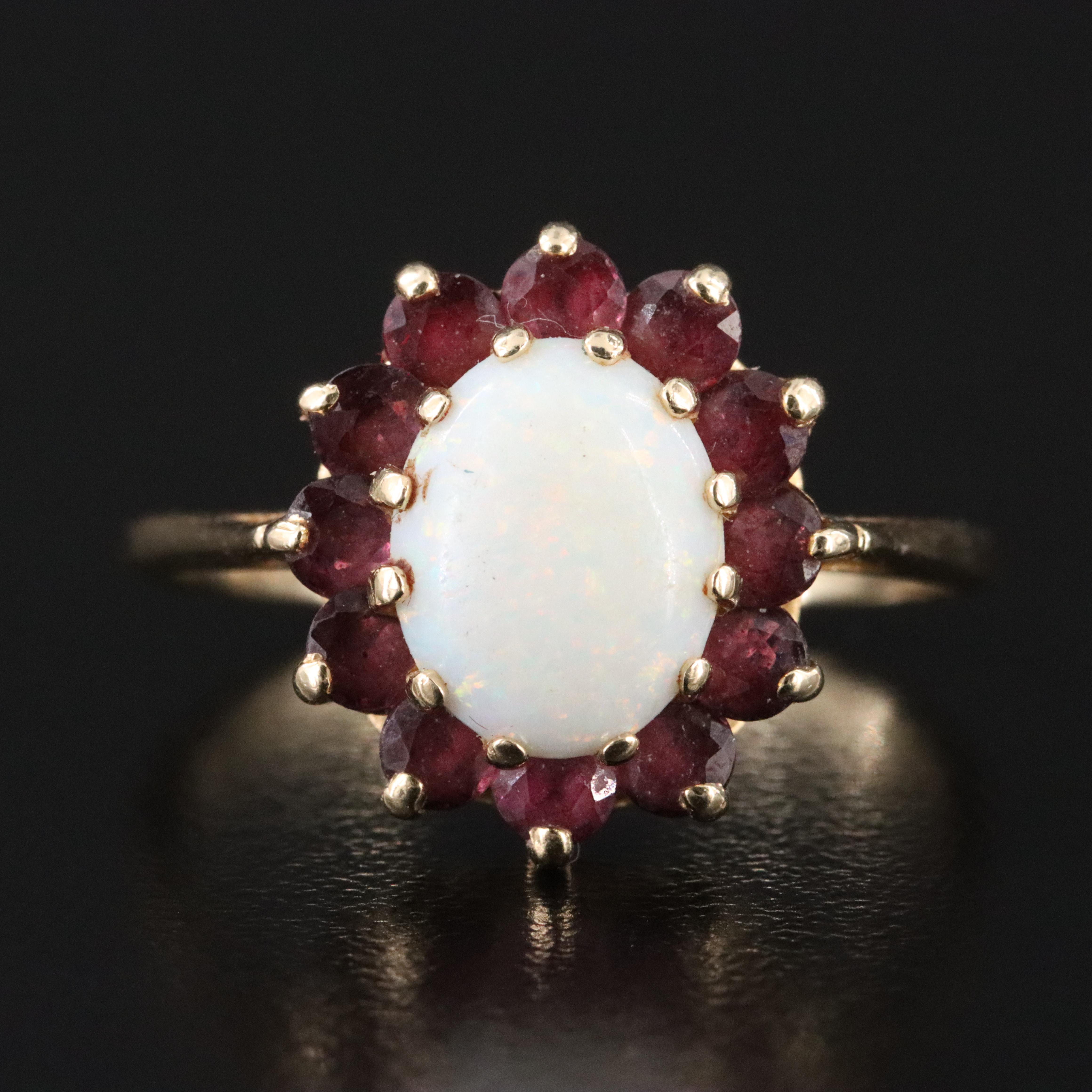 Vintage 14K Opal and Ruby Halo Ring