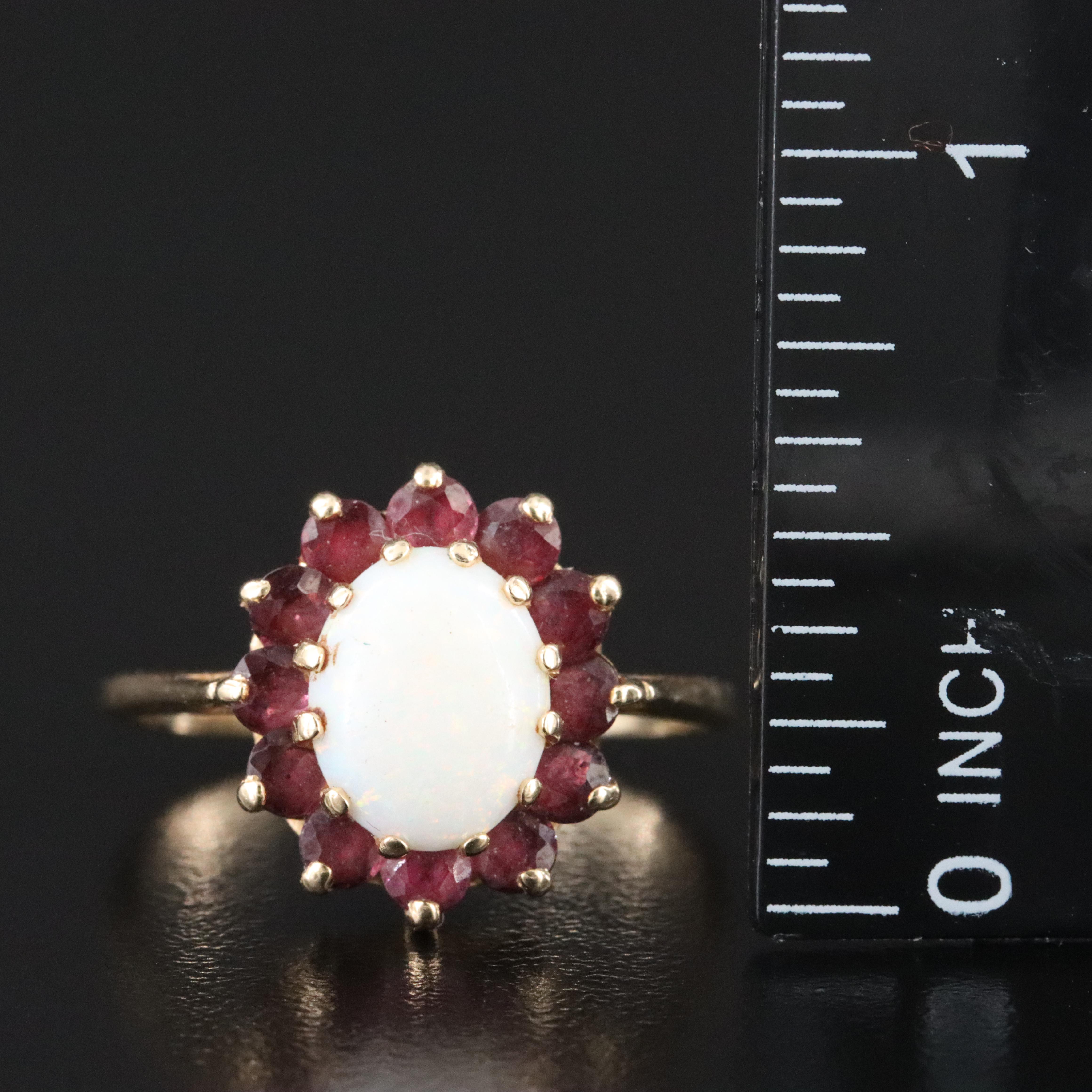 Vintage 14K Opal and Ruby Halo Ring