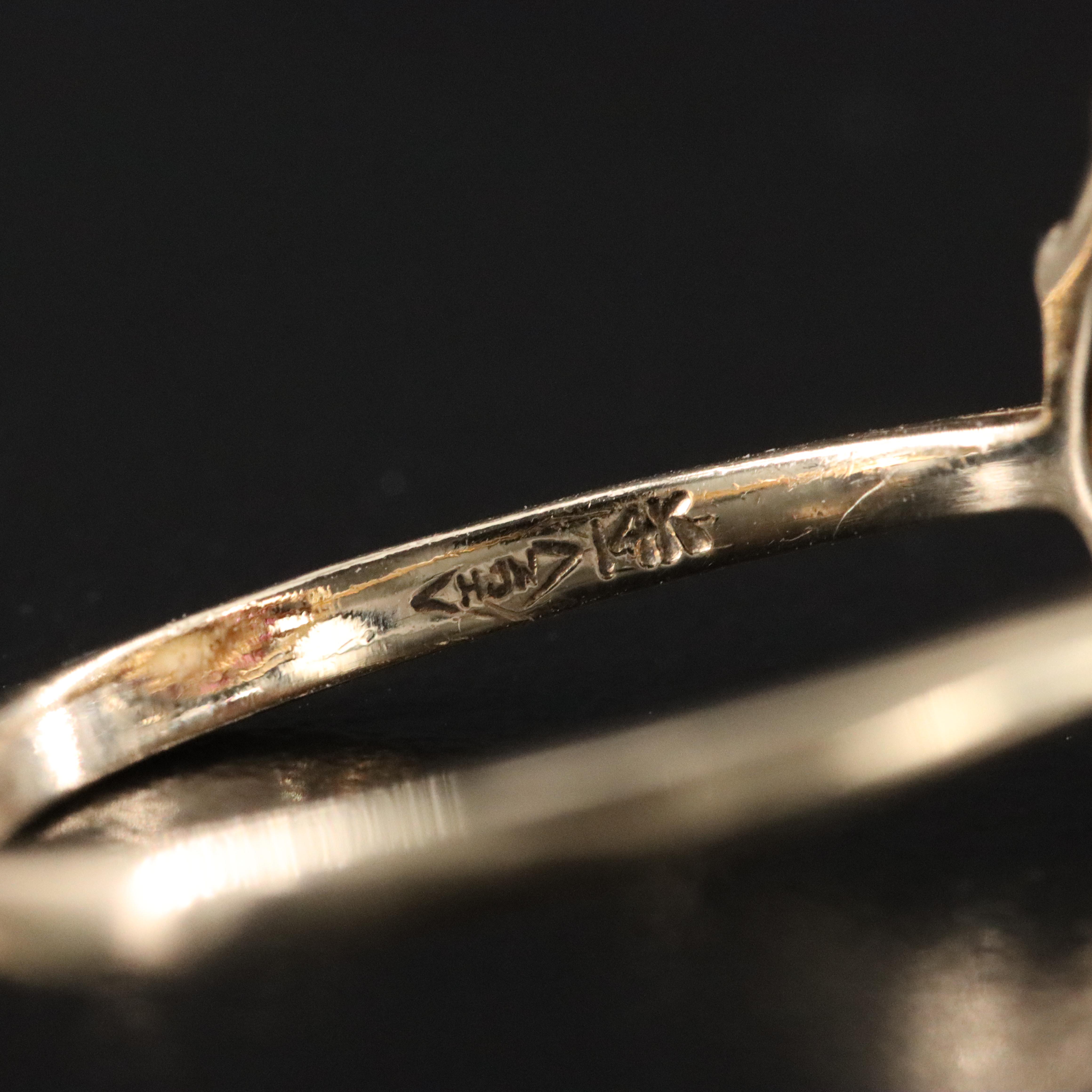 Vintage 14K Opal and Ruby Halo Ring