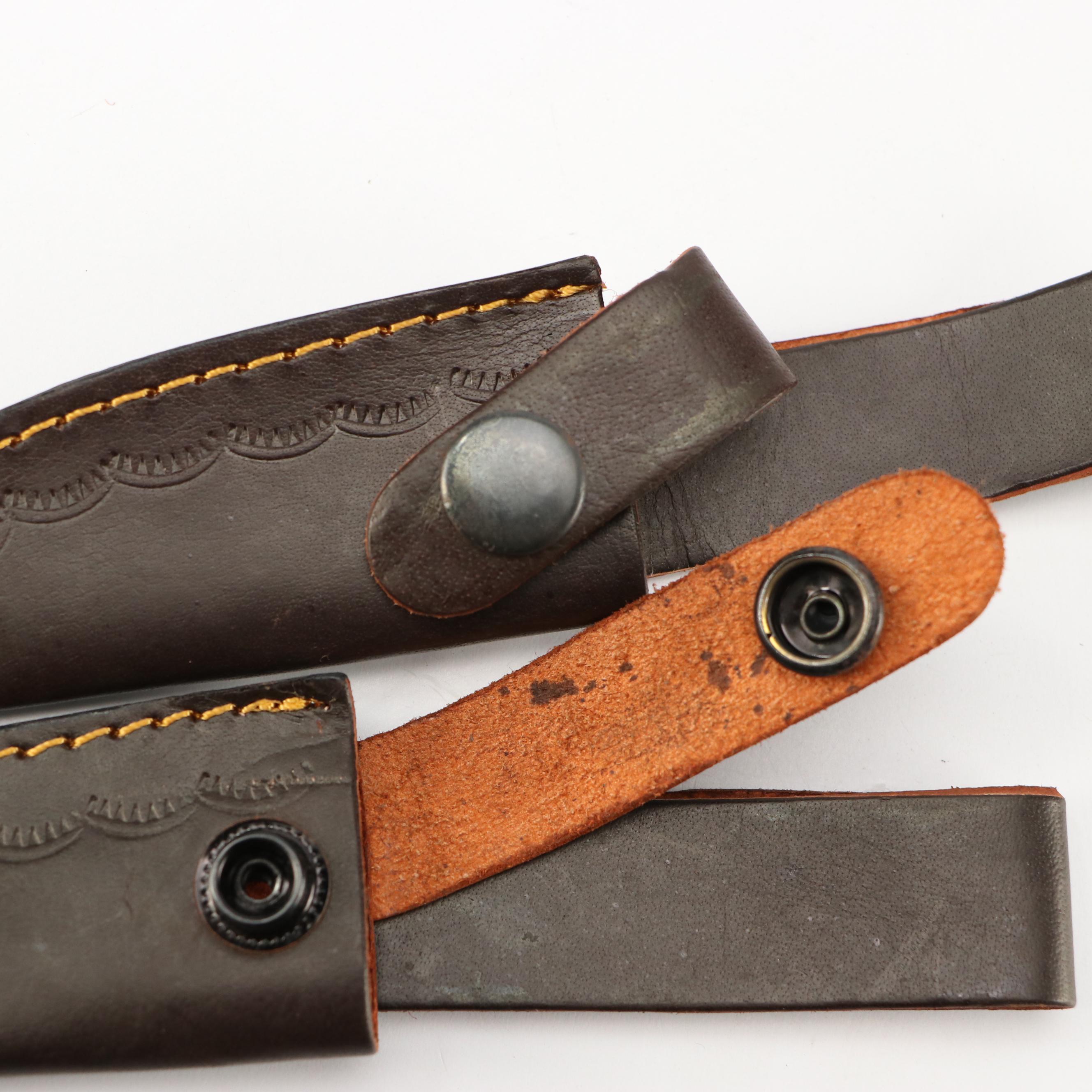 Damascus Steel and Antler Handled Skinner Knives in Leather Scabbards