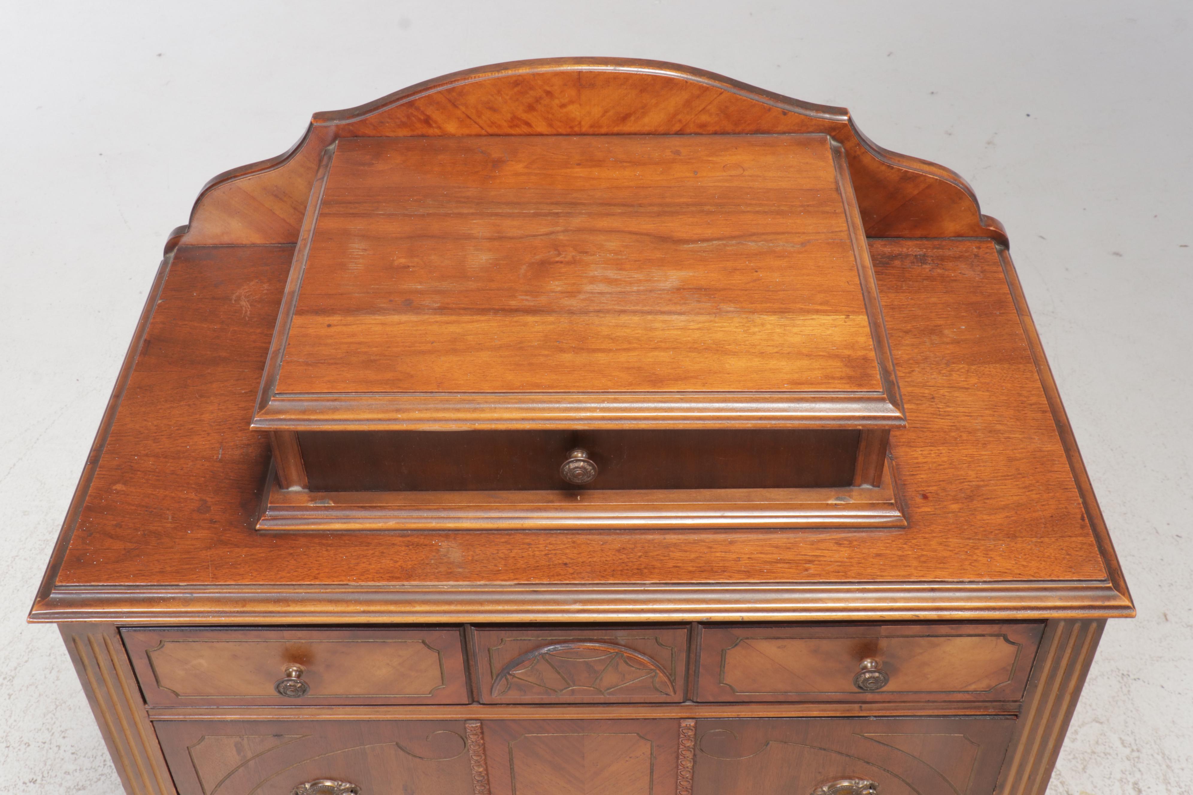 E. Kleeman Co. Jacobean Revival Style Mahogany and Waterfall Chest of Drawers
