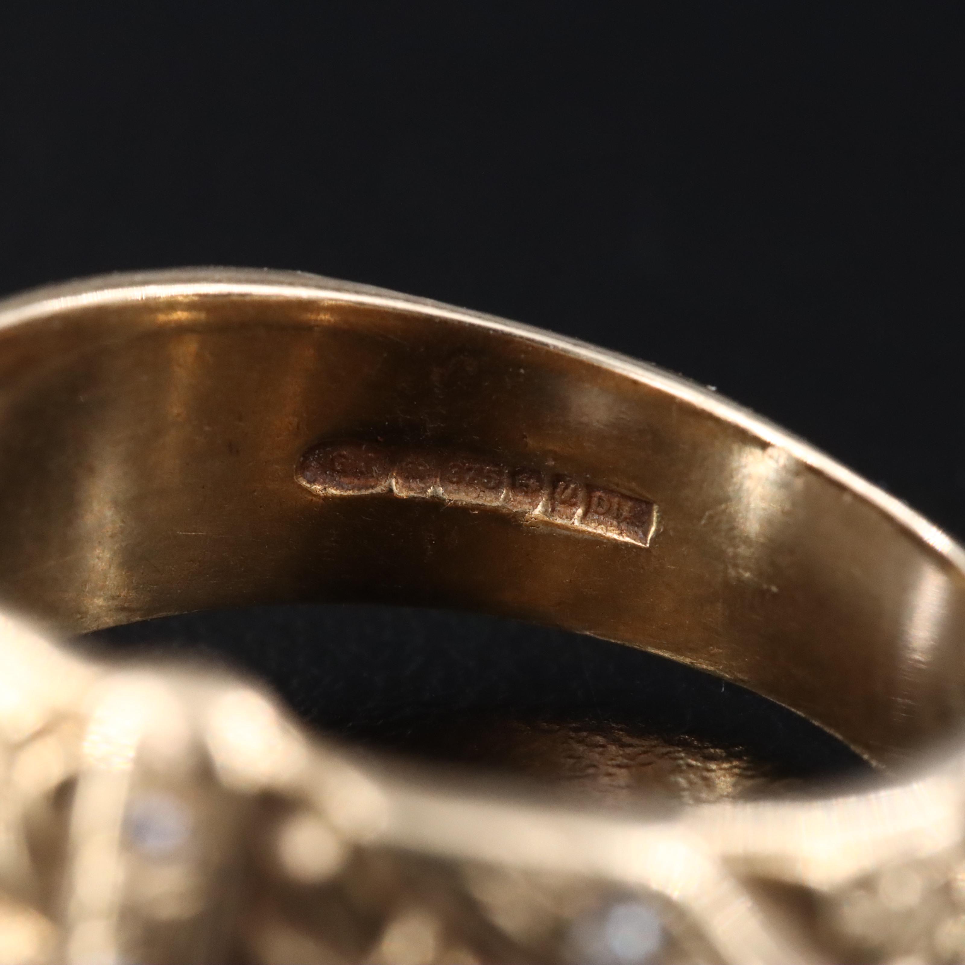 Early 1900s 9K 0.07 CTW Diamond Buckle Ring