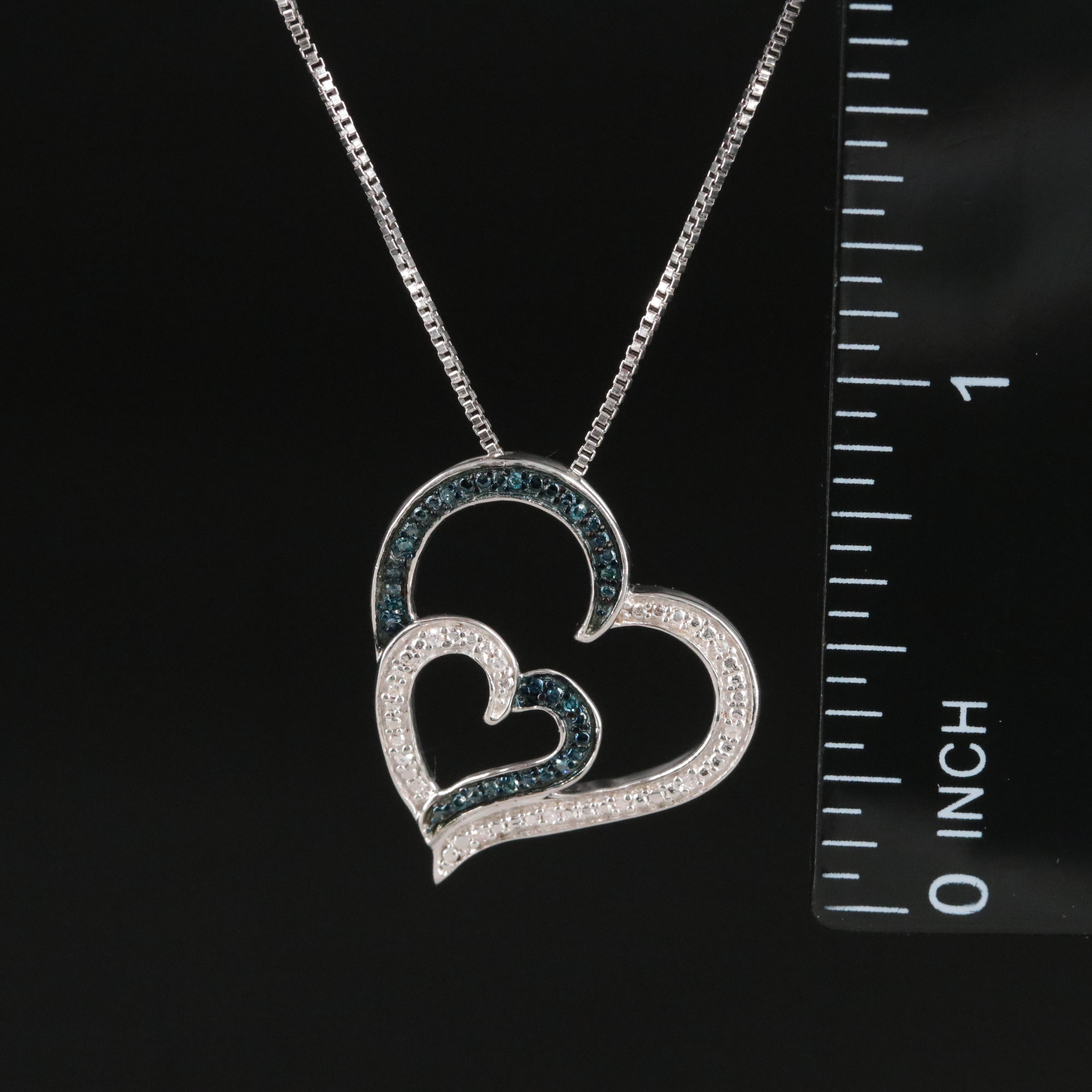 Sterling Diamond Heart Pendant Necklace Featuring Fancy Blue Diamonds