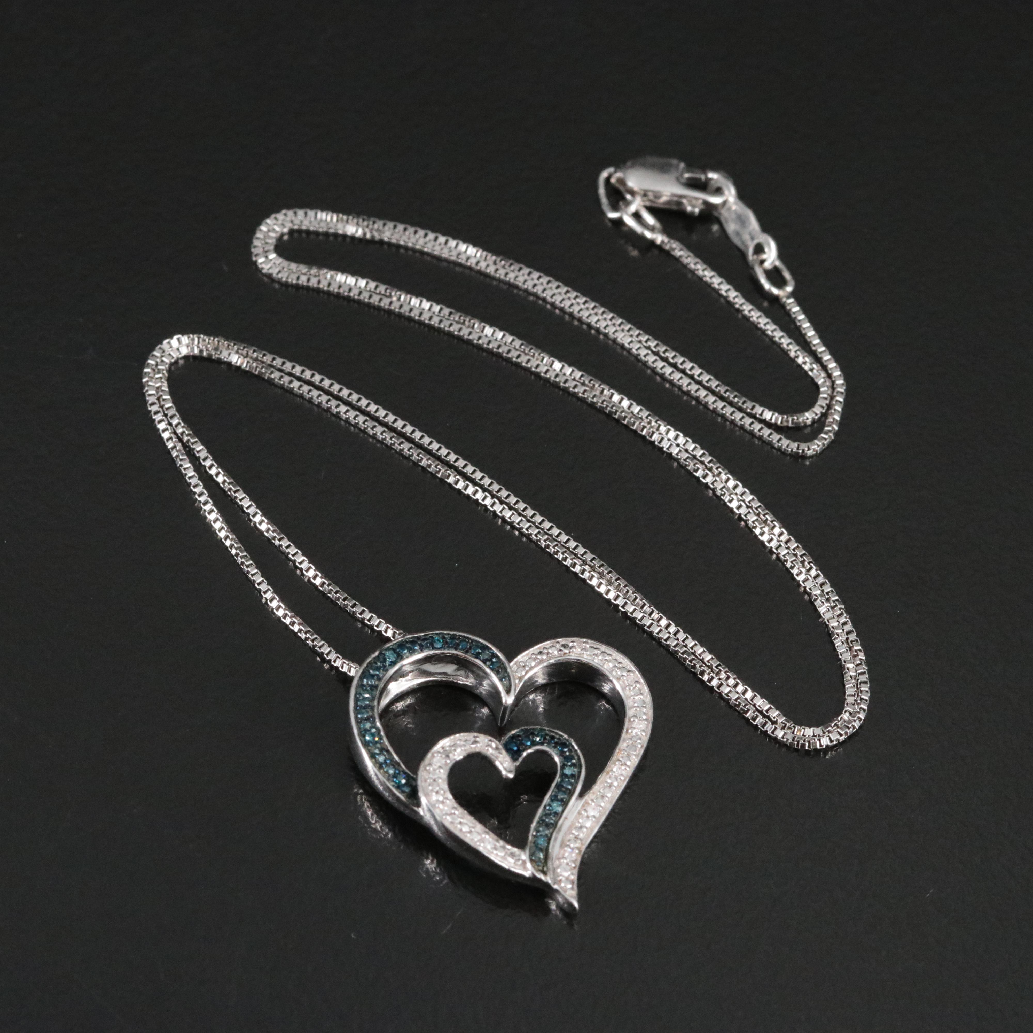 Sterling Diamond Heart Pendant Necklace Featuring Fancy Blue Diamonds