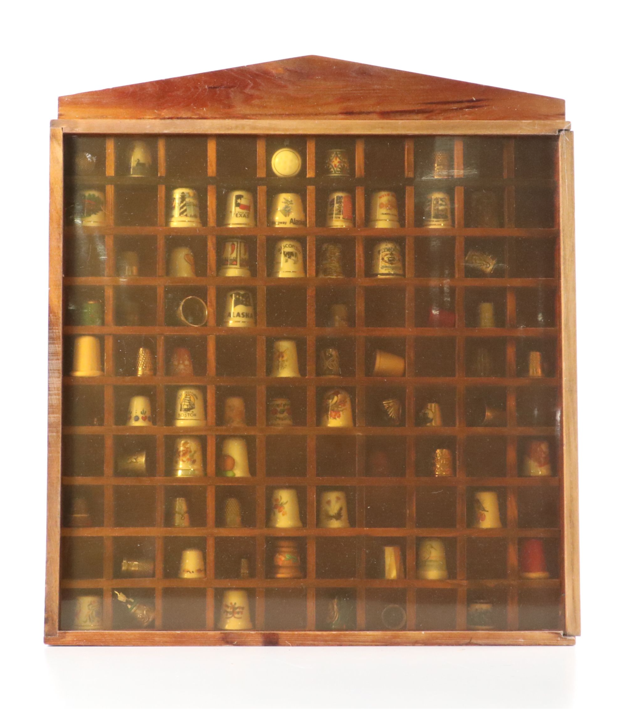 Thimble Collection Including Texas, Mexico, London and More in Display