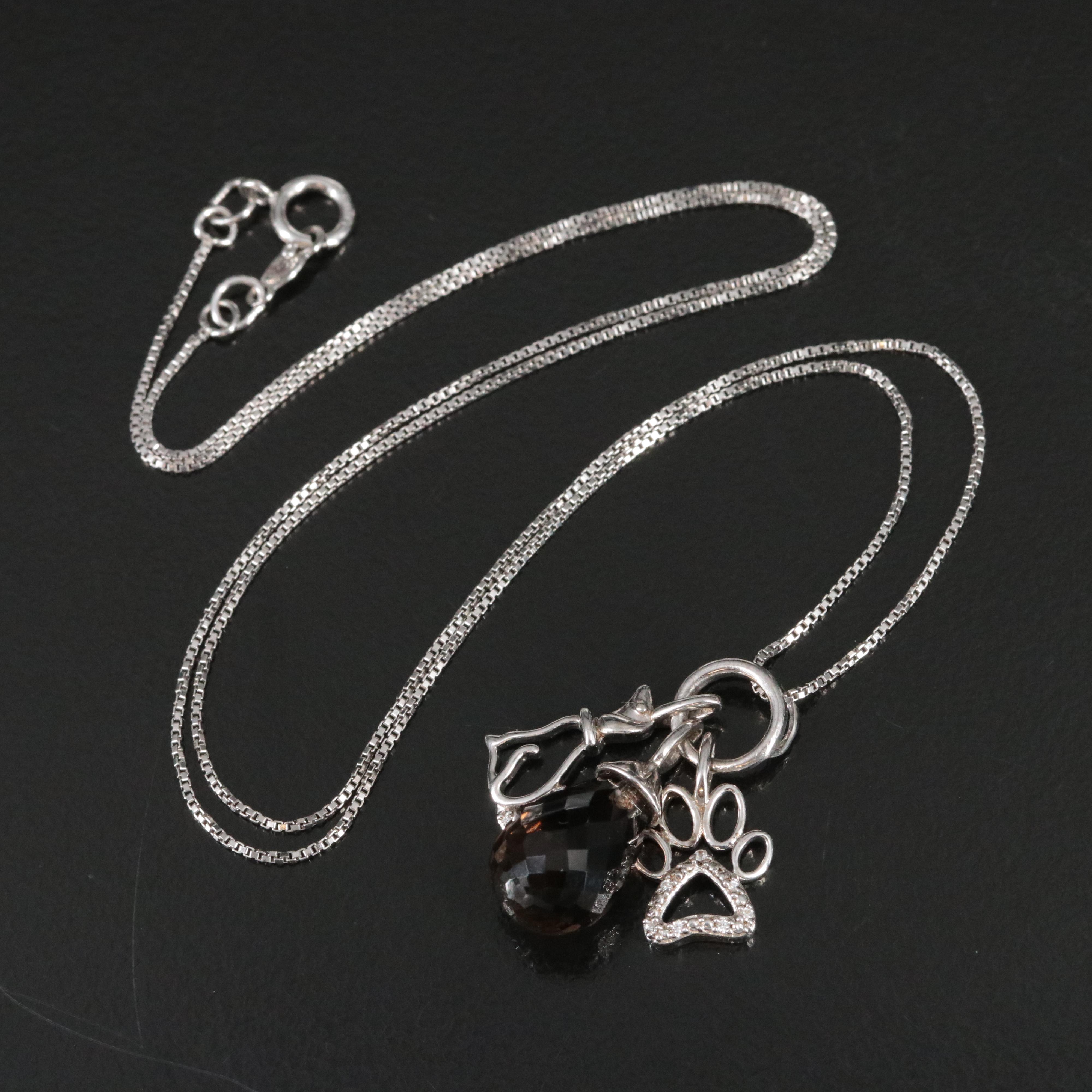 Sterling Smoky Quartz, White Sapphire and Cubic Zirconia Drop Pendant