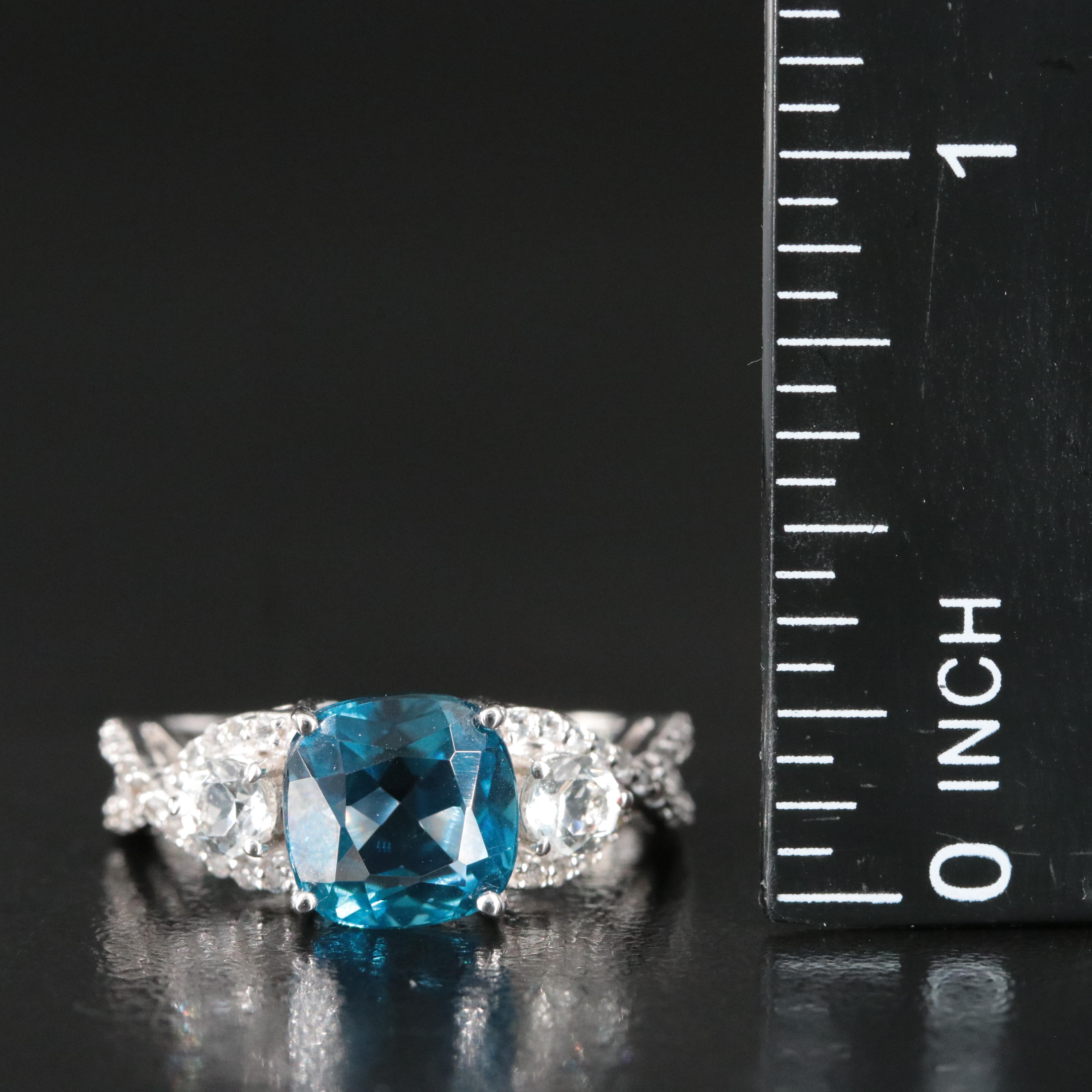 Sterling Swiss Blue Topaz and White Sapphire Crossover Ring