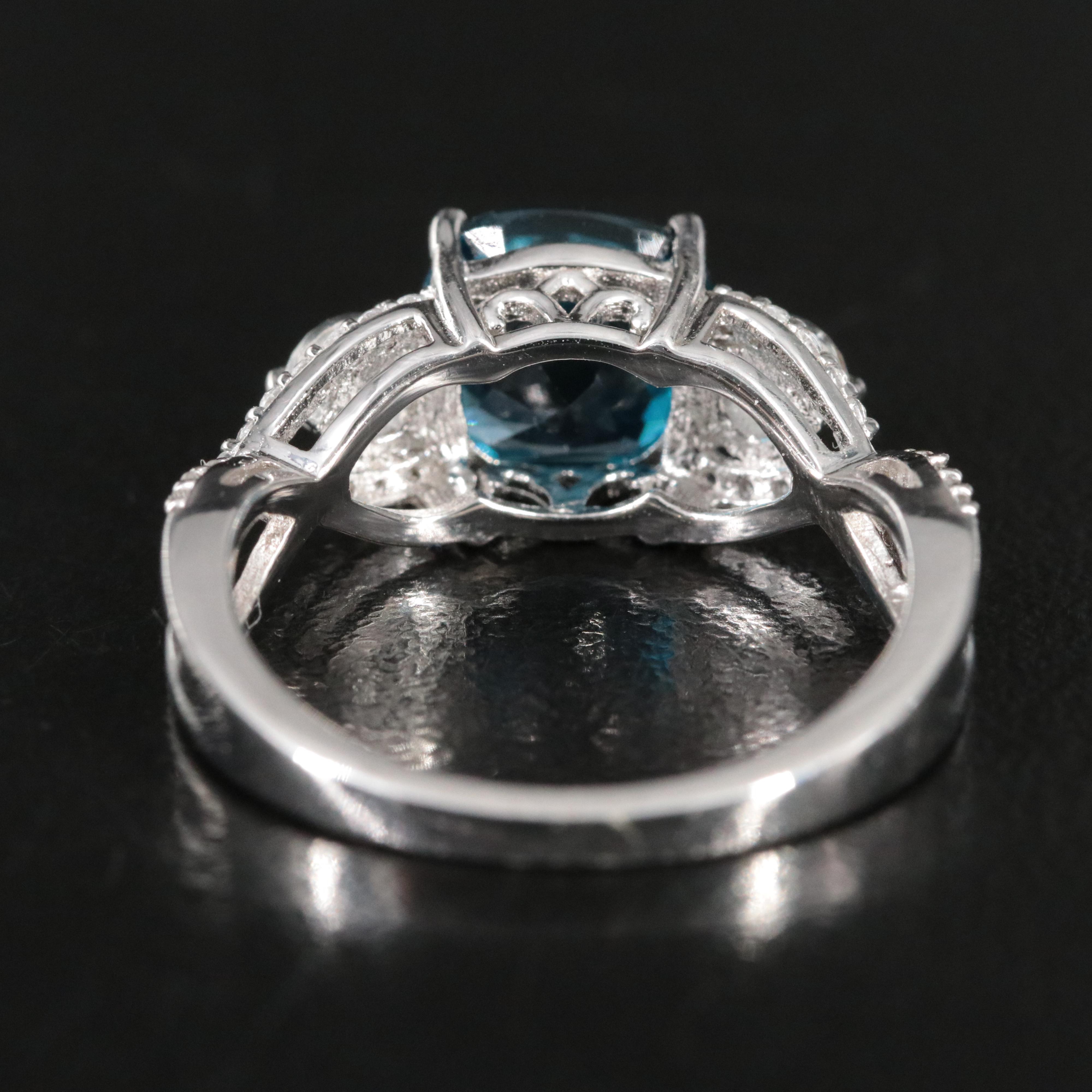 Sterling Swiss Blue Topaz and White Sapphire Crossover Ring