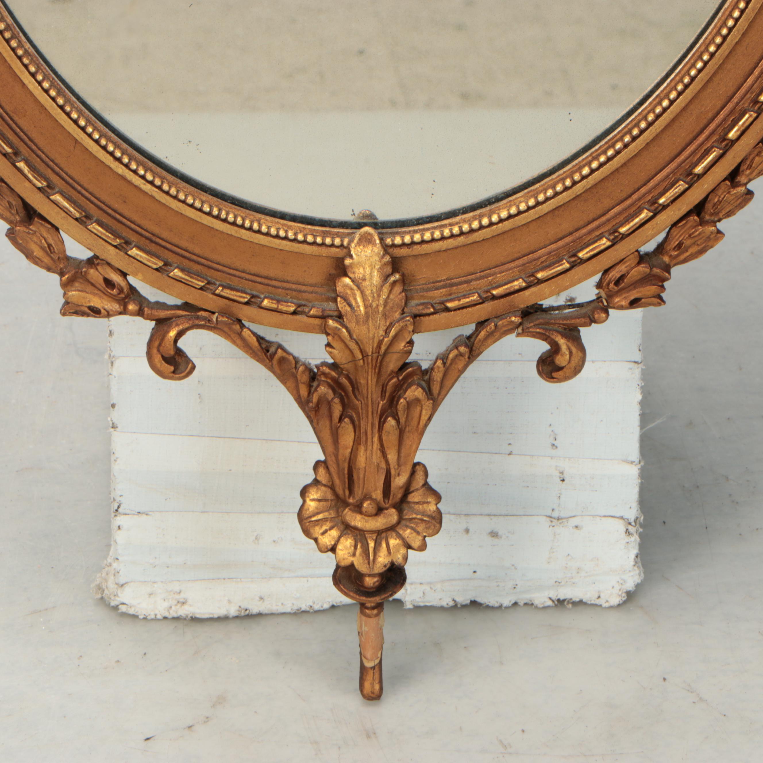 Adams Style Giltwood and Molded Plaster Oval Wall Mirror, 19th Century