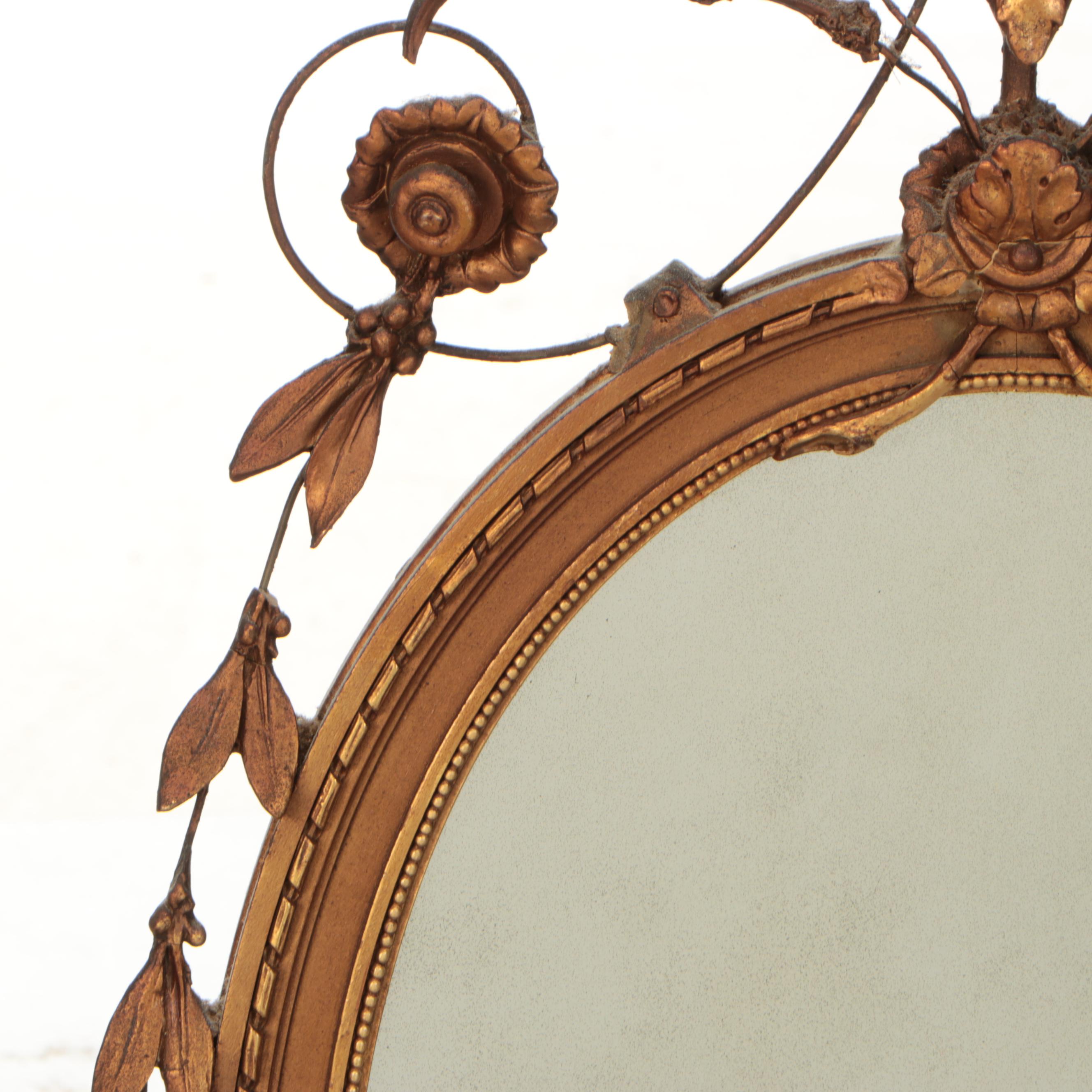 Adams Style Giltwood and Molded Plaster Oval Wall Mirror, 19th Century
