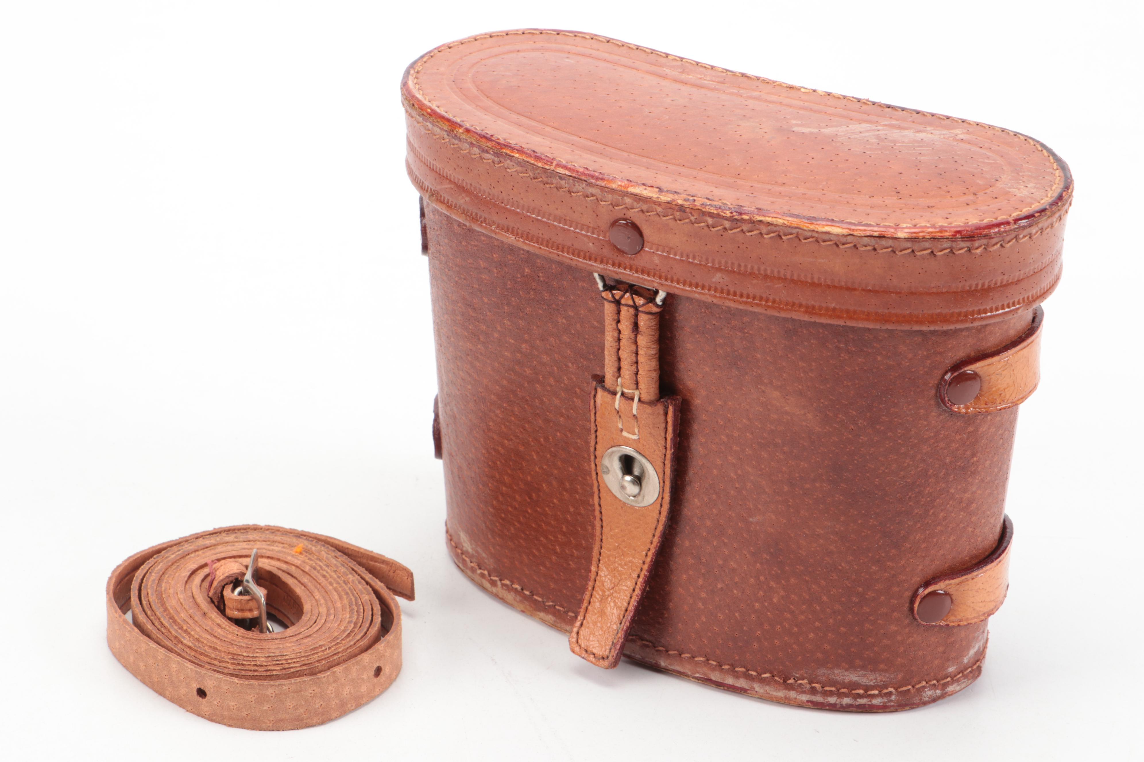 Garmin Automotive GPS and Stellar Binoculars with Leather Carrying Case