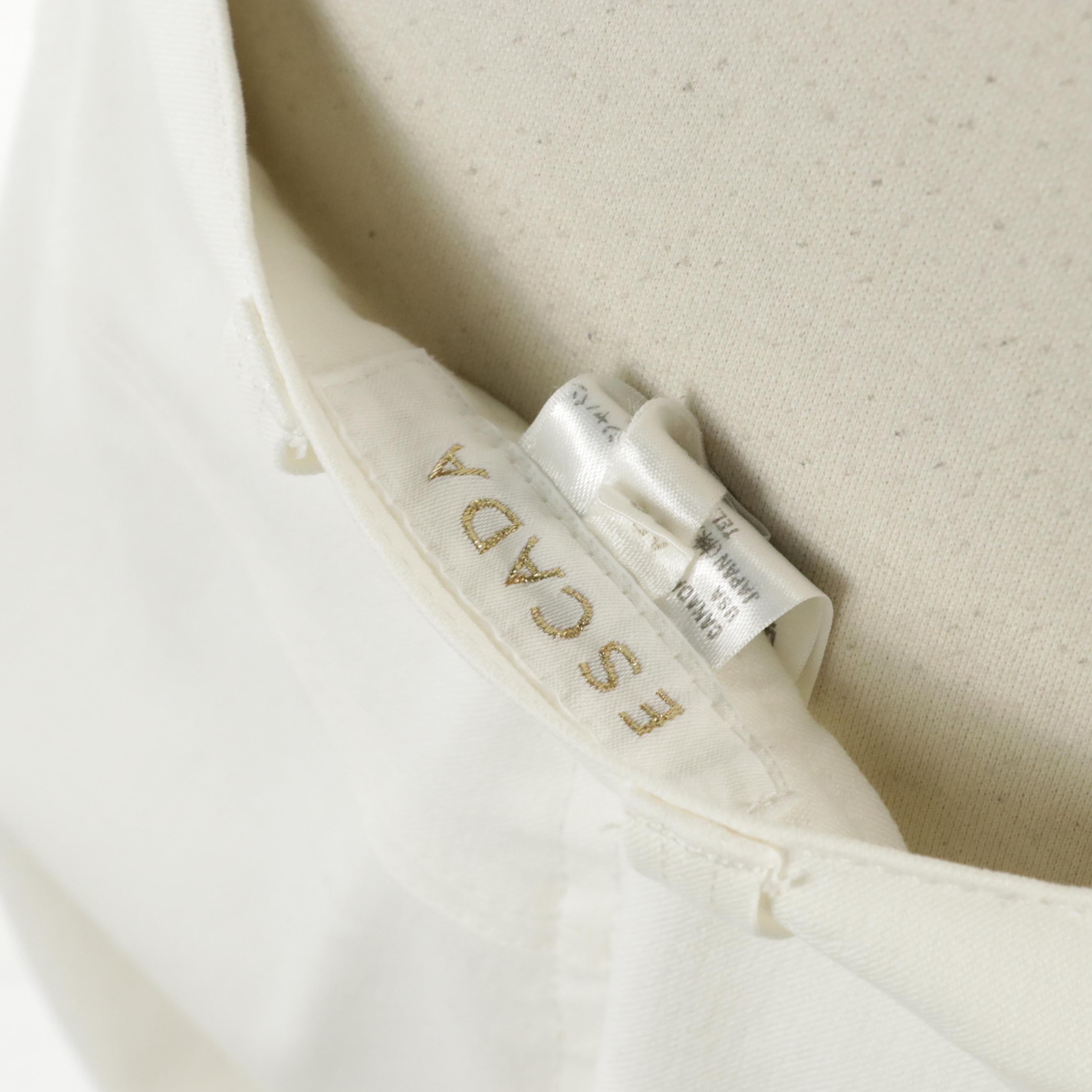 Escada Cut-Out Batwing Sleeve Pullover Knit Sweater and Cropped Stretch Jeans