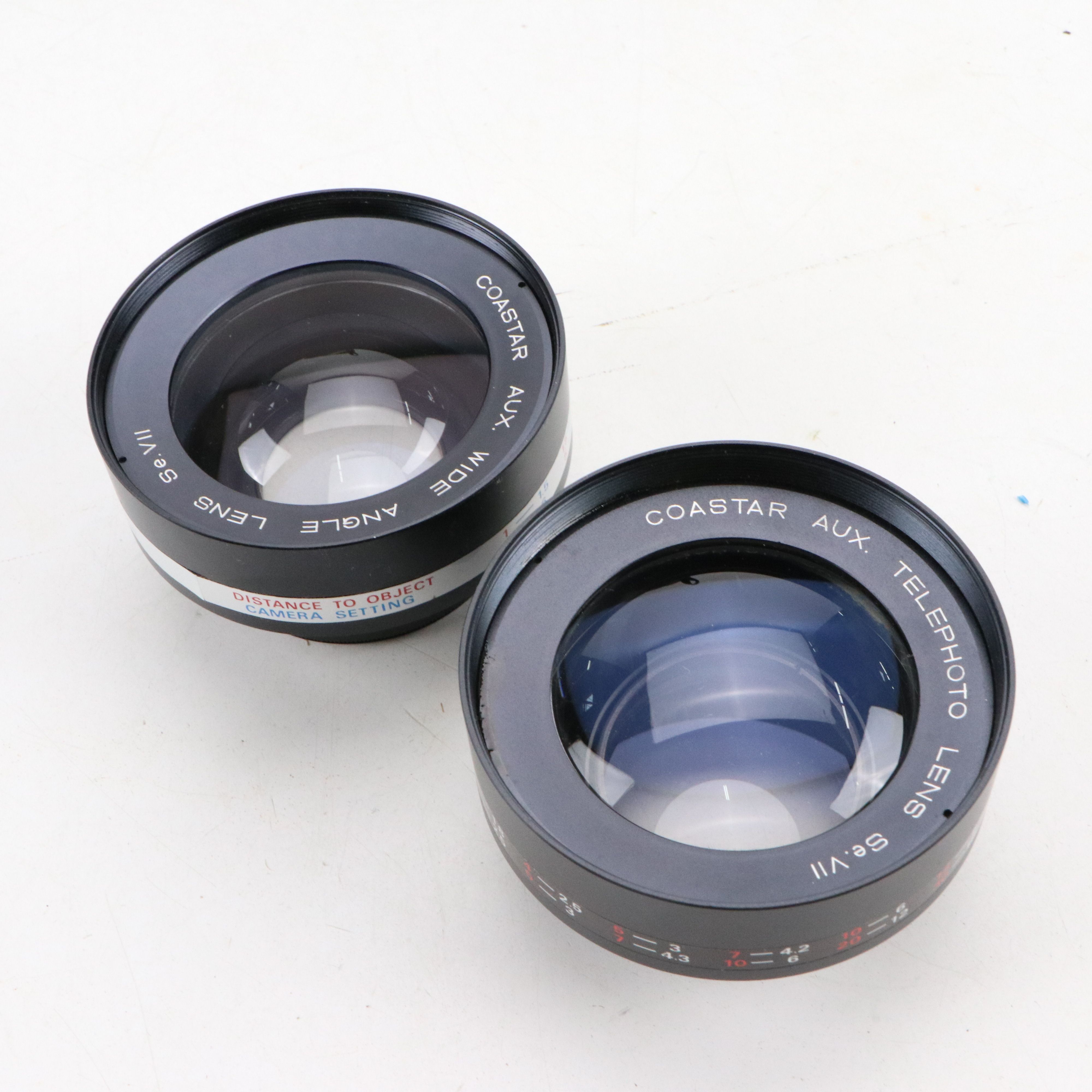 Canon Eos and Yashica MG-1 Still Cameras with Additional Accessories