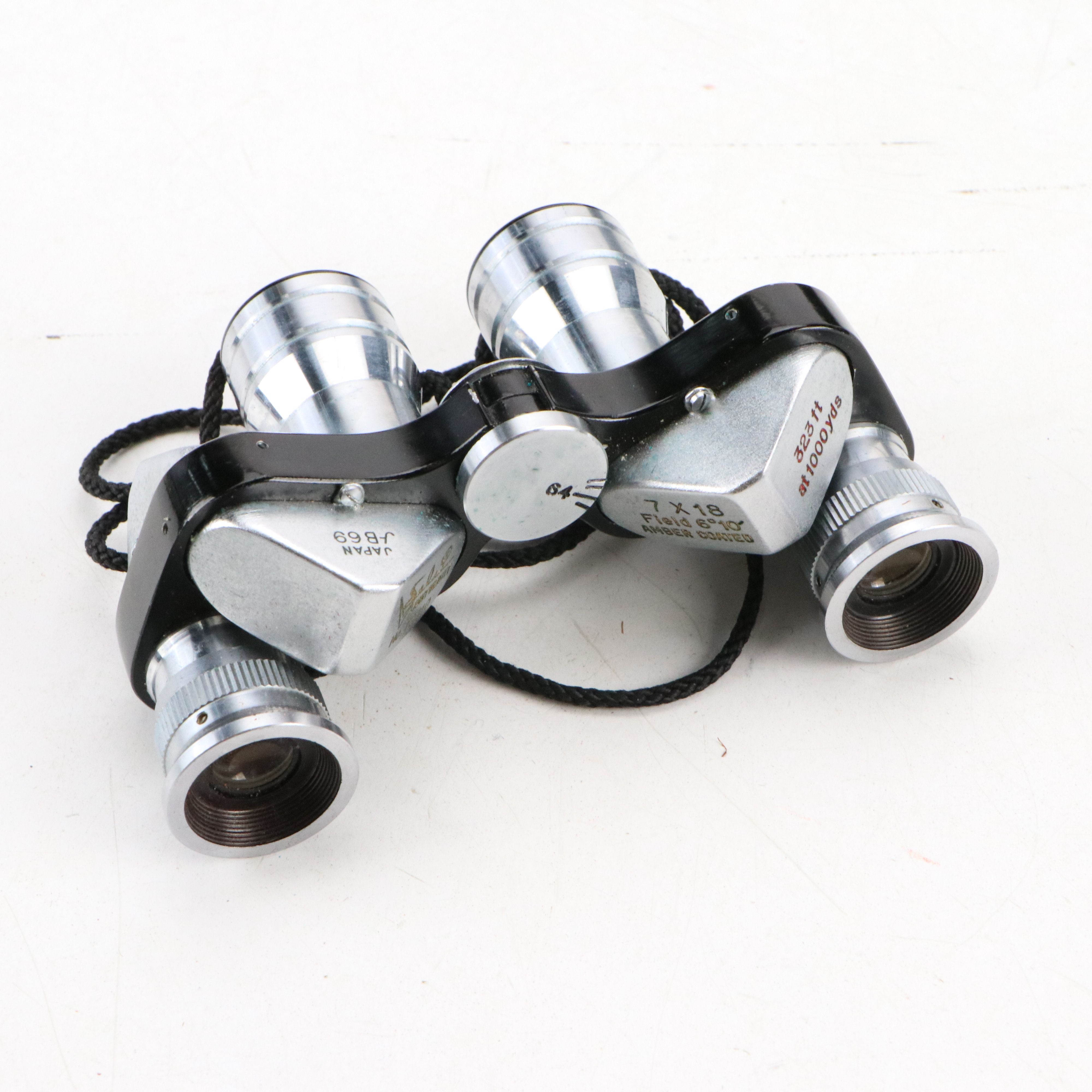 Canon Eos and Yashica MG-1 Still Cameras with Additional Accessories