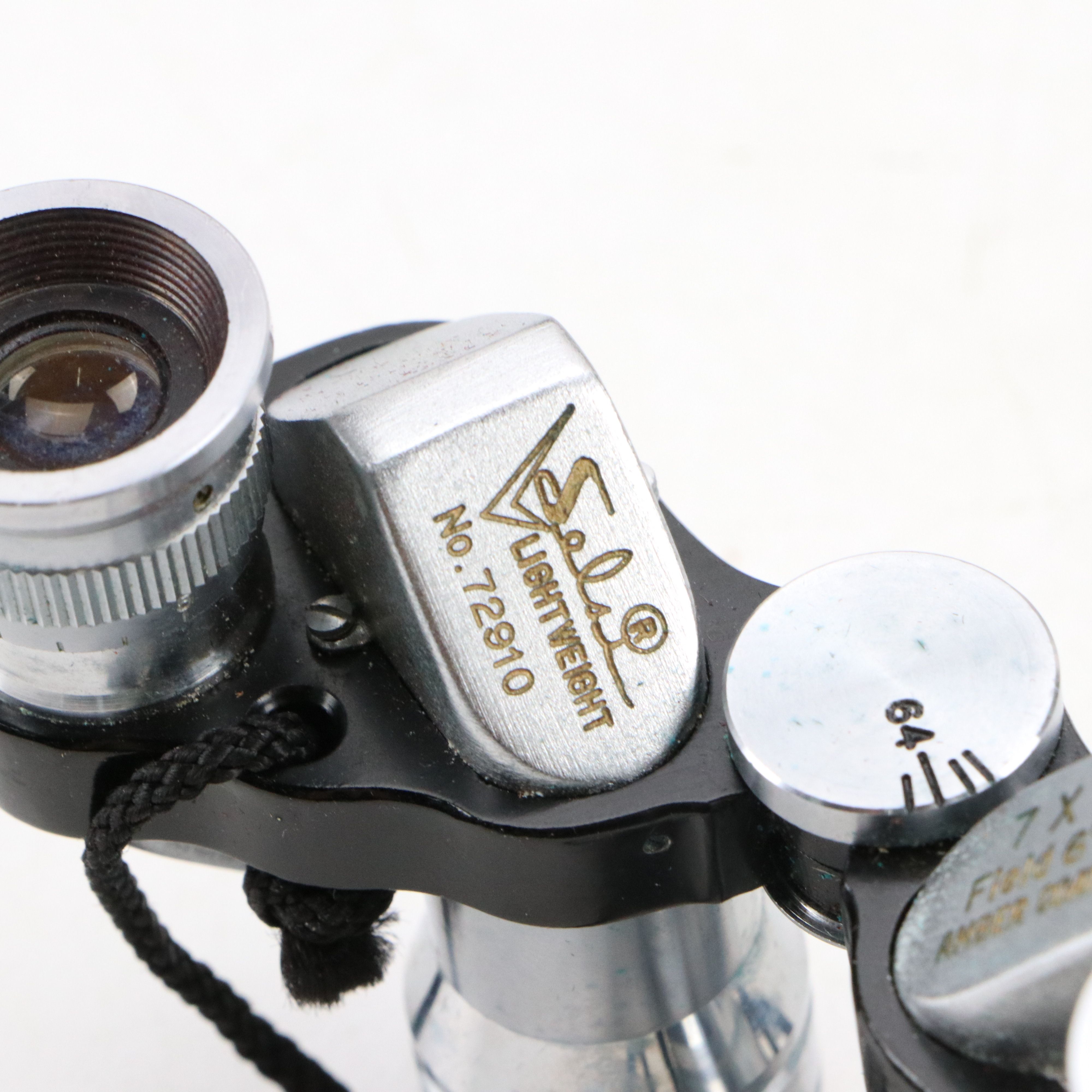 Canon Eos and Yashica MG-1 Still Cameras with Additional Accessories