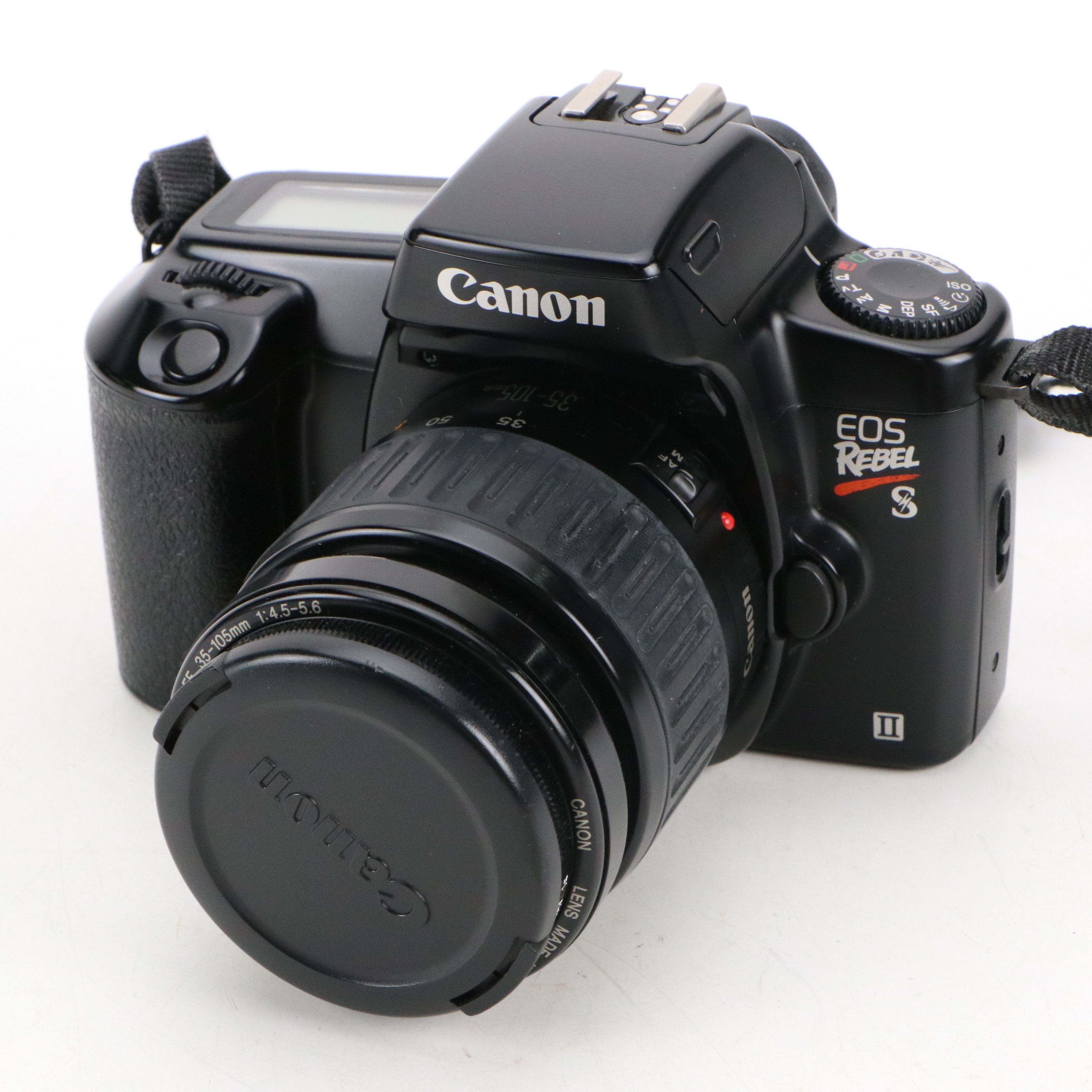 Canon Eos and Yashica MG-1 Still Cameras with Additional Accessories