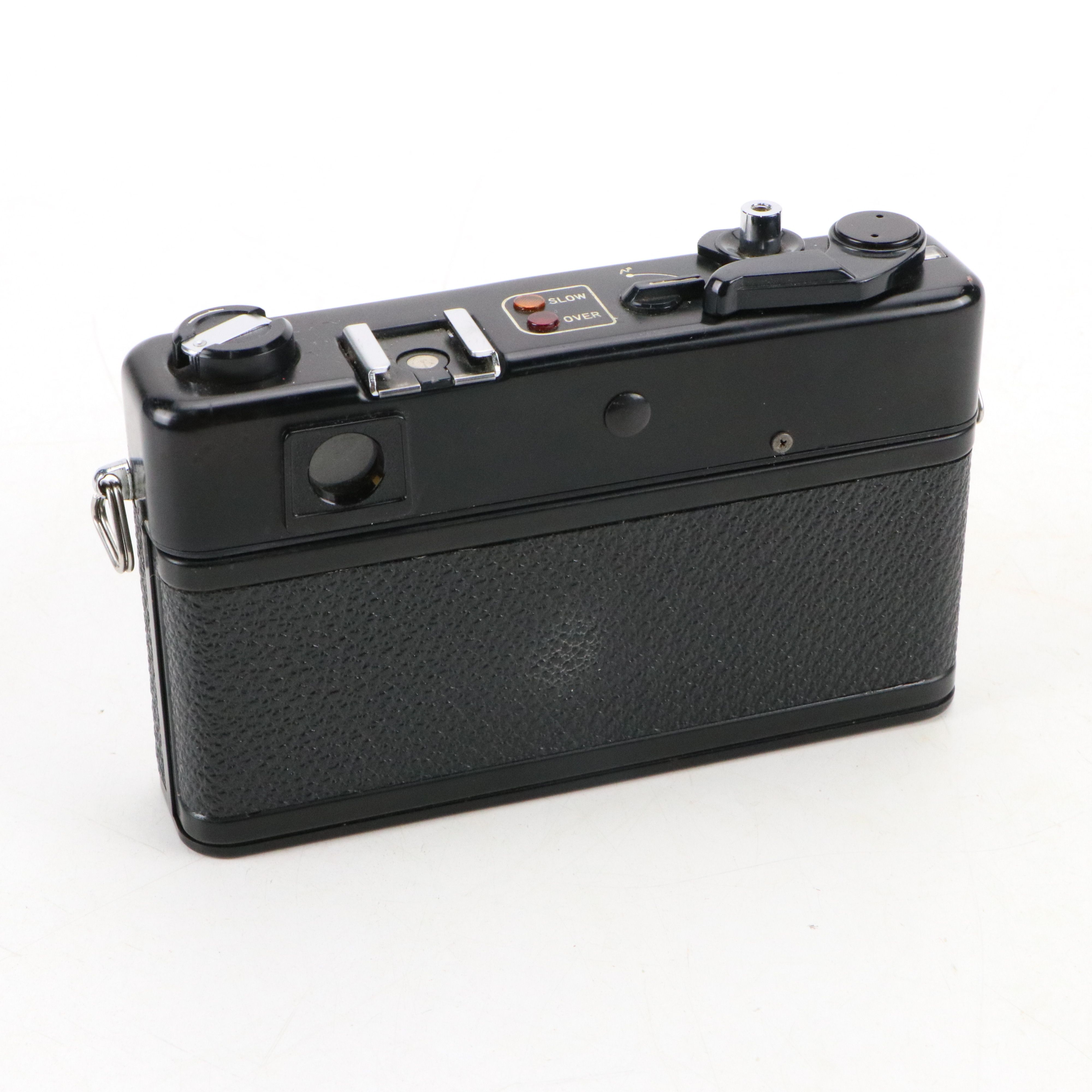 Canon Eos and Yashica MG-1 Still Cameras with Additional Accessories