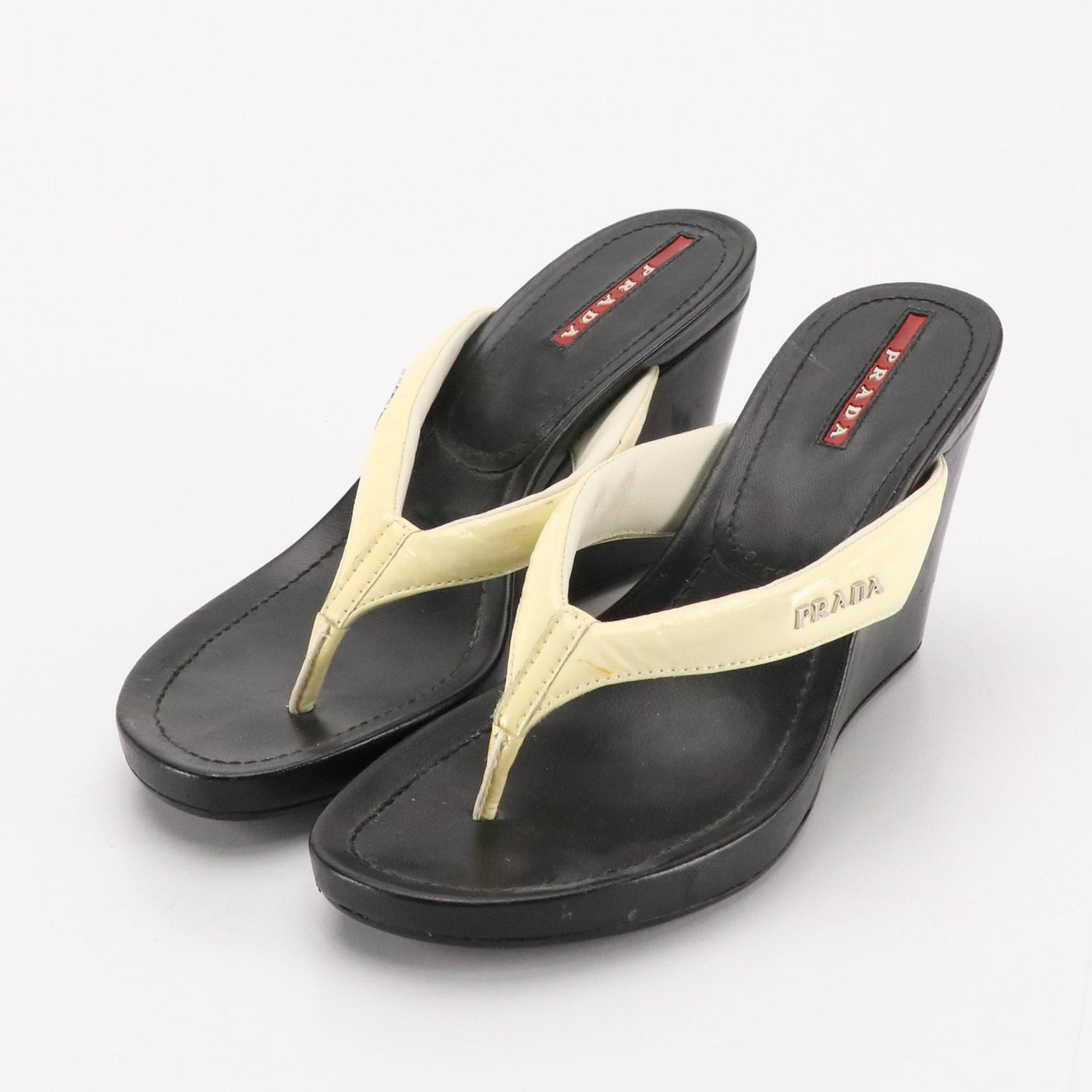 Prada Padded Thong-Strap Wedge Sandals in Ivory Patent & Black Calfskin Leather