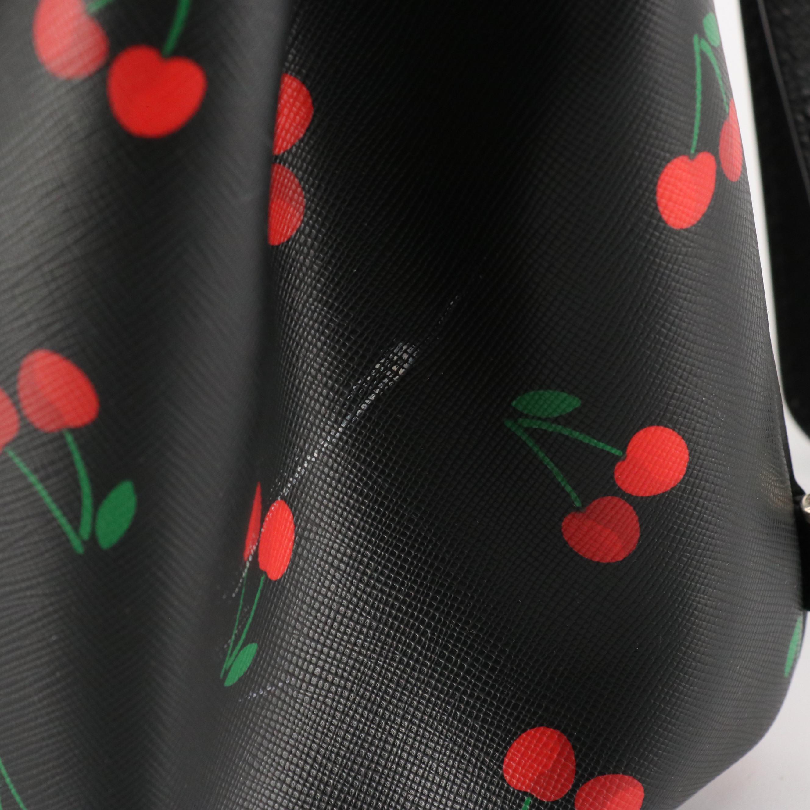 Kate Spade "Lizzie" Medium Flap Backpack in Tossed Cherry Print Saffiano PVC