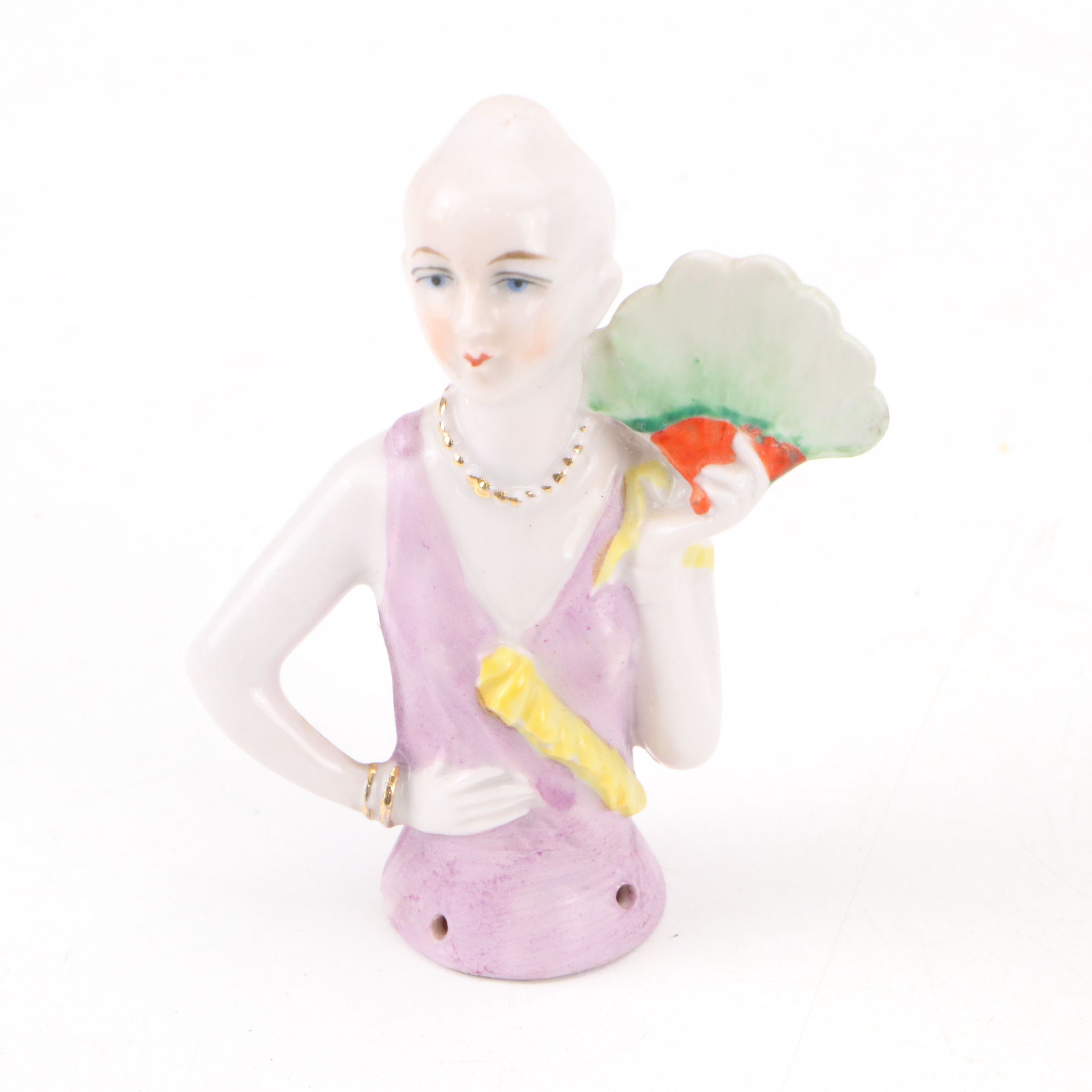 Maltese Cross and Other Napkin Rings with Porcelain Half Doll and Other Decor