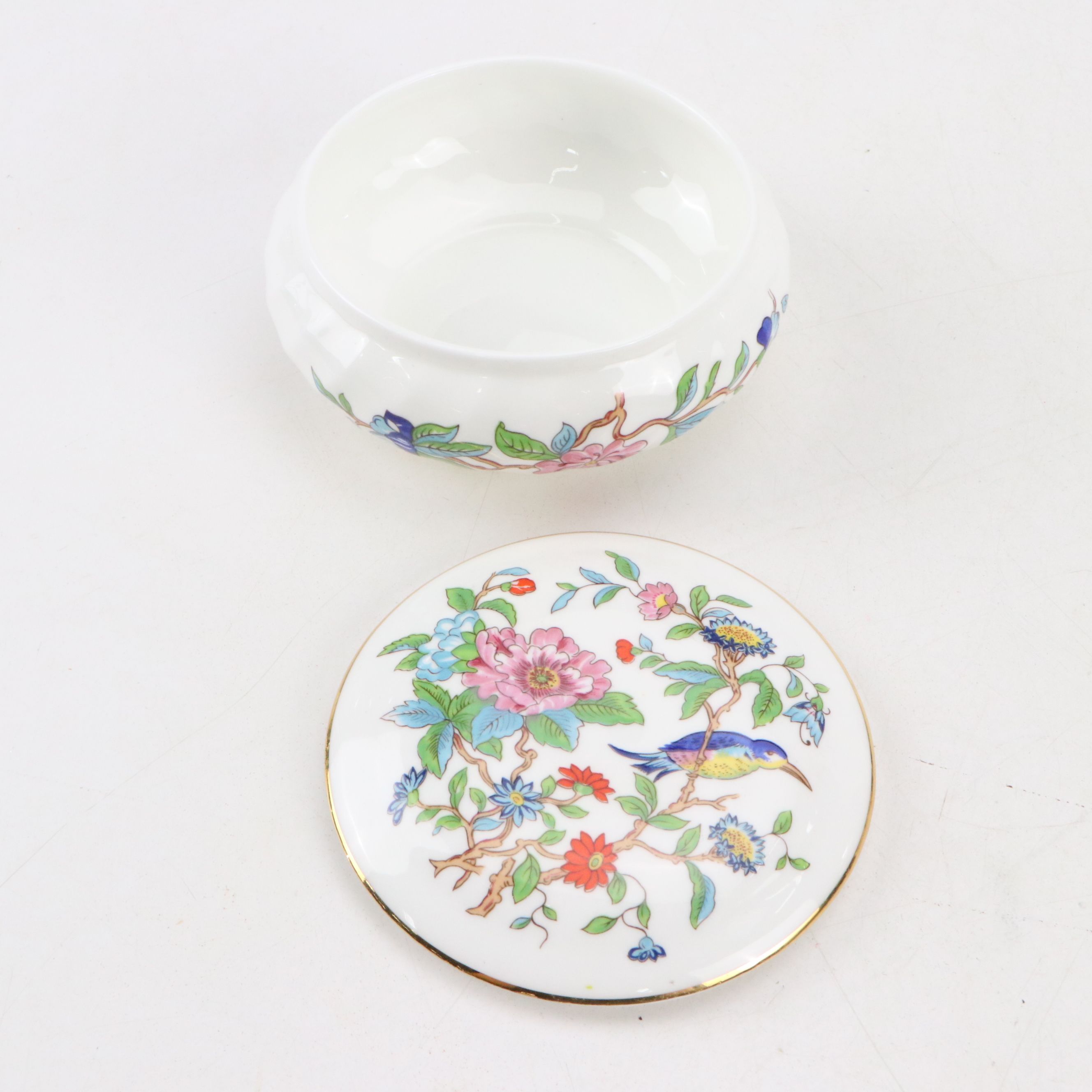 Maltese Cross and Other Napkin Rings with Porcelain Half Doll and Other Decor