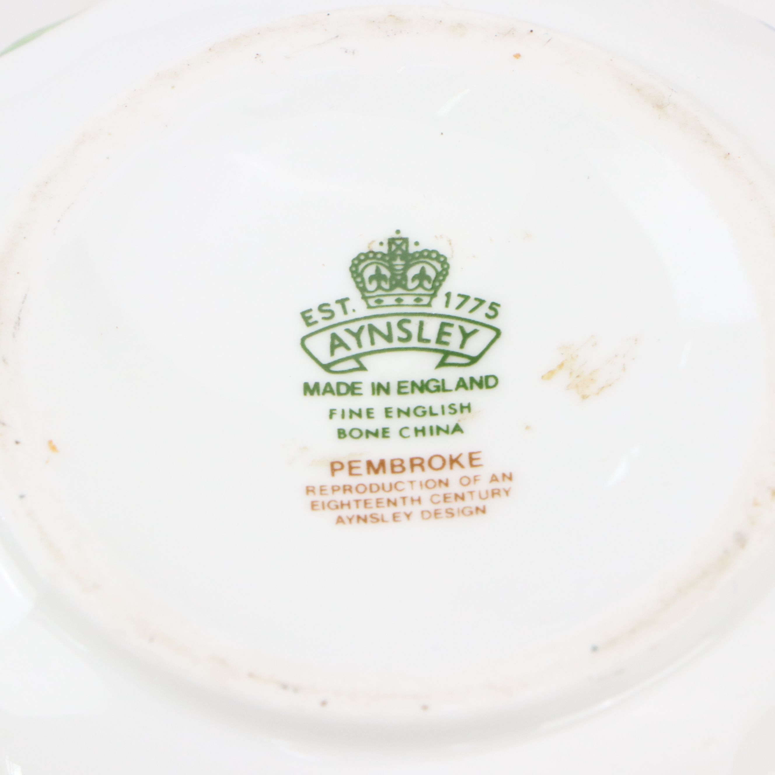 Maltese Cross and Other Napkin Rings with Porcelain Half Doll and Other Decor