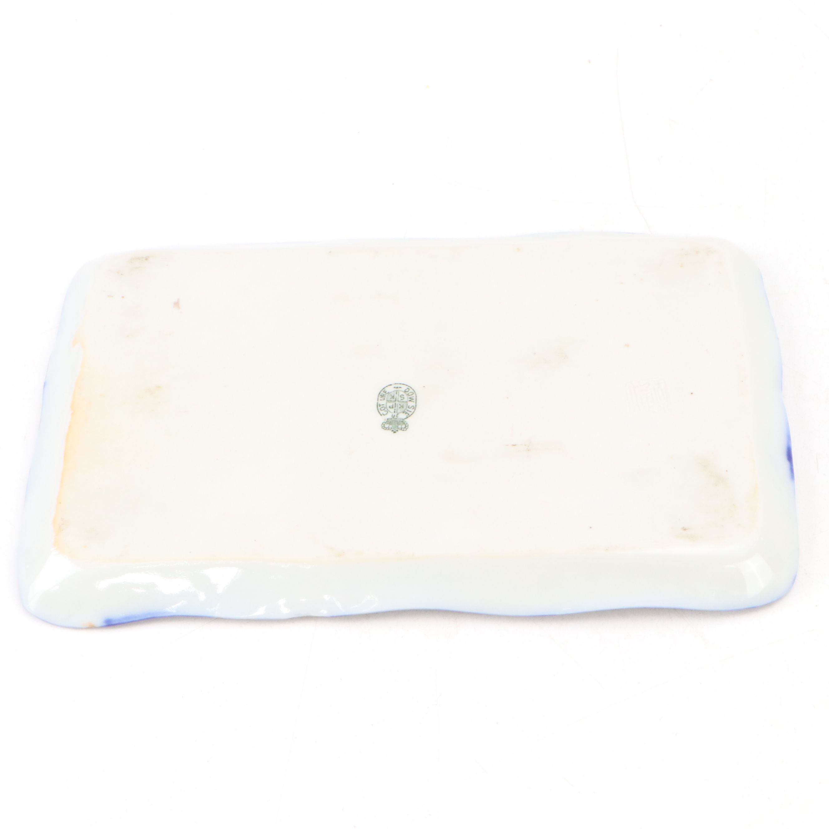 Maltese Cross and Other Napkin Rings with Porcelain Half Doll and Other Decor