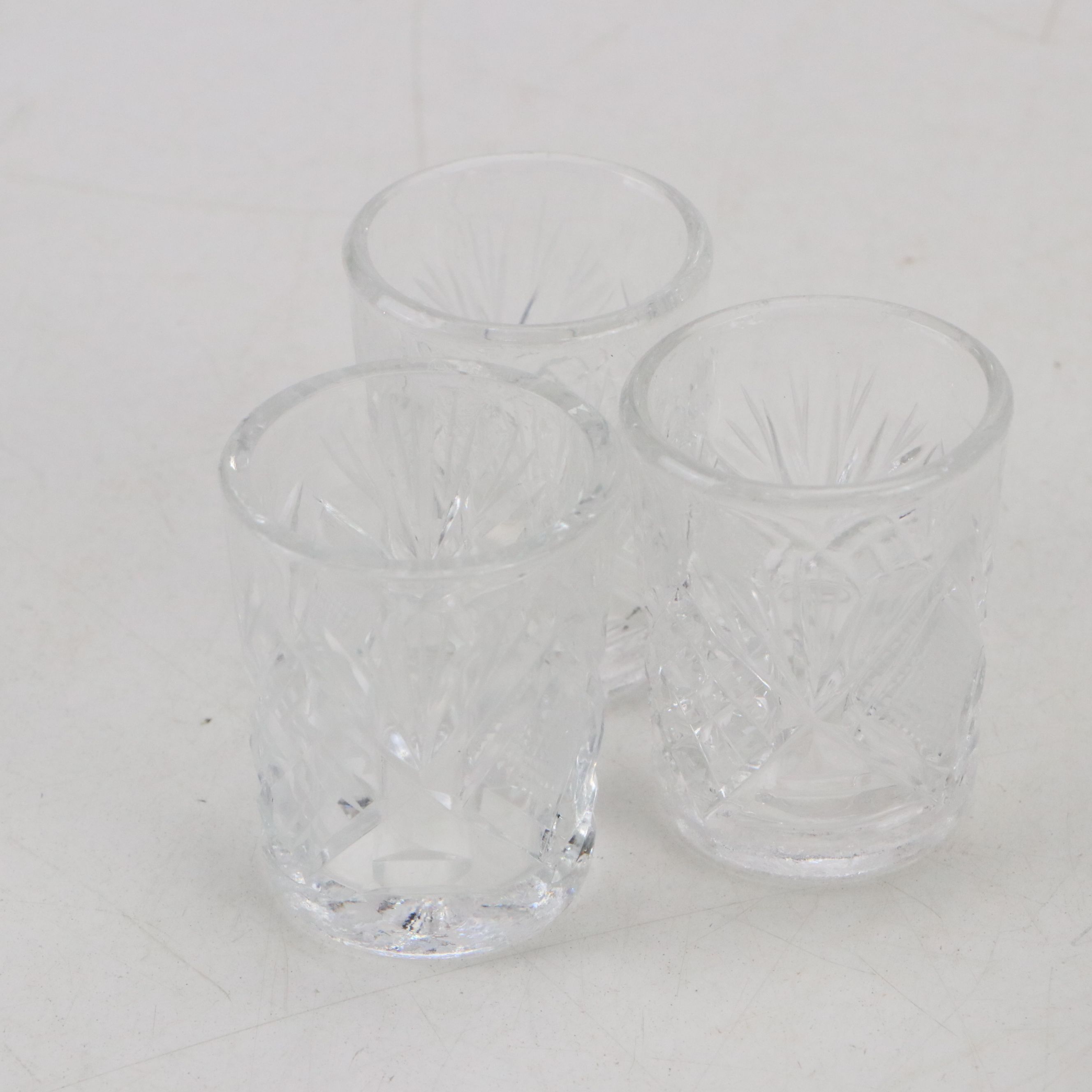 Maltese Cross and Other Napkin Rings with Porcelain Half Doll and Other Decor