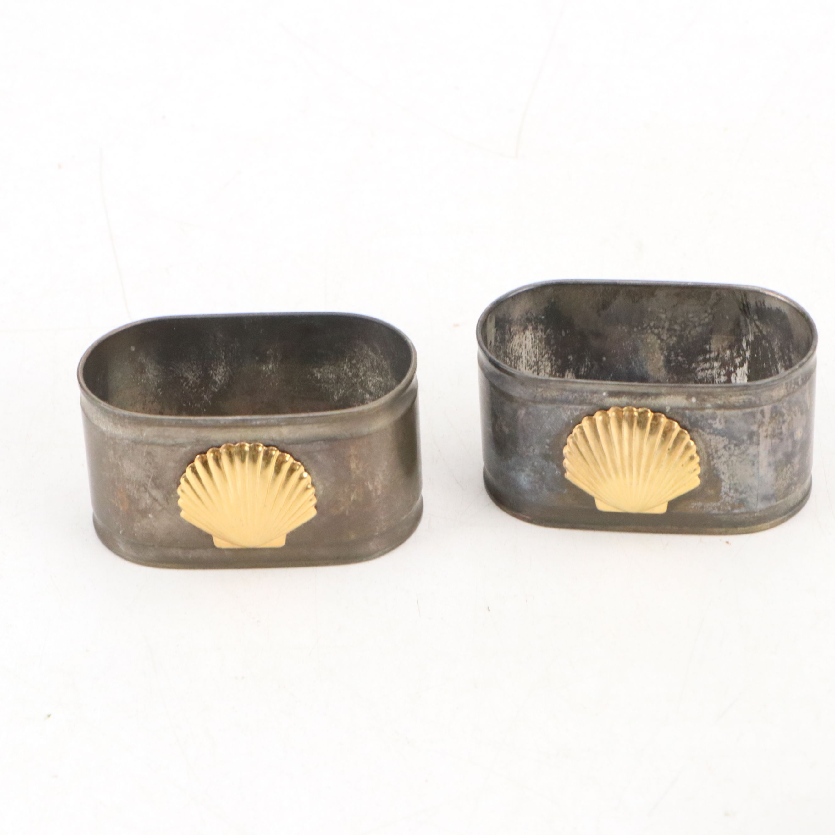 Maltese Cross and Other Napkin Rings with Porcelain Half Doll and Other Decor