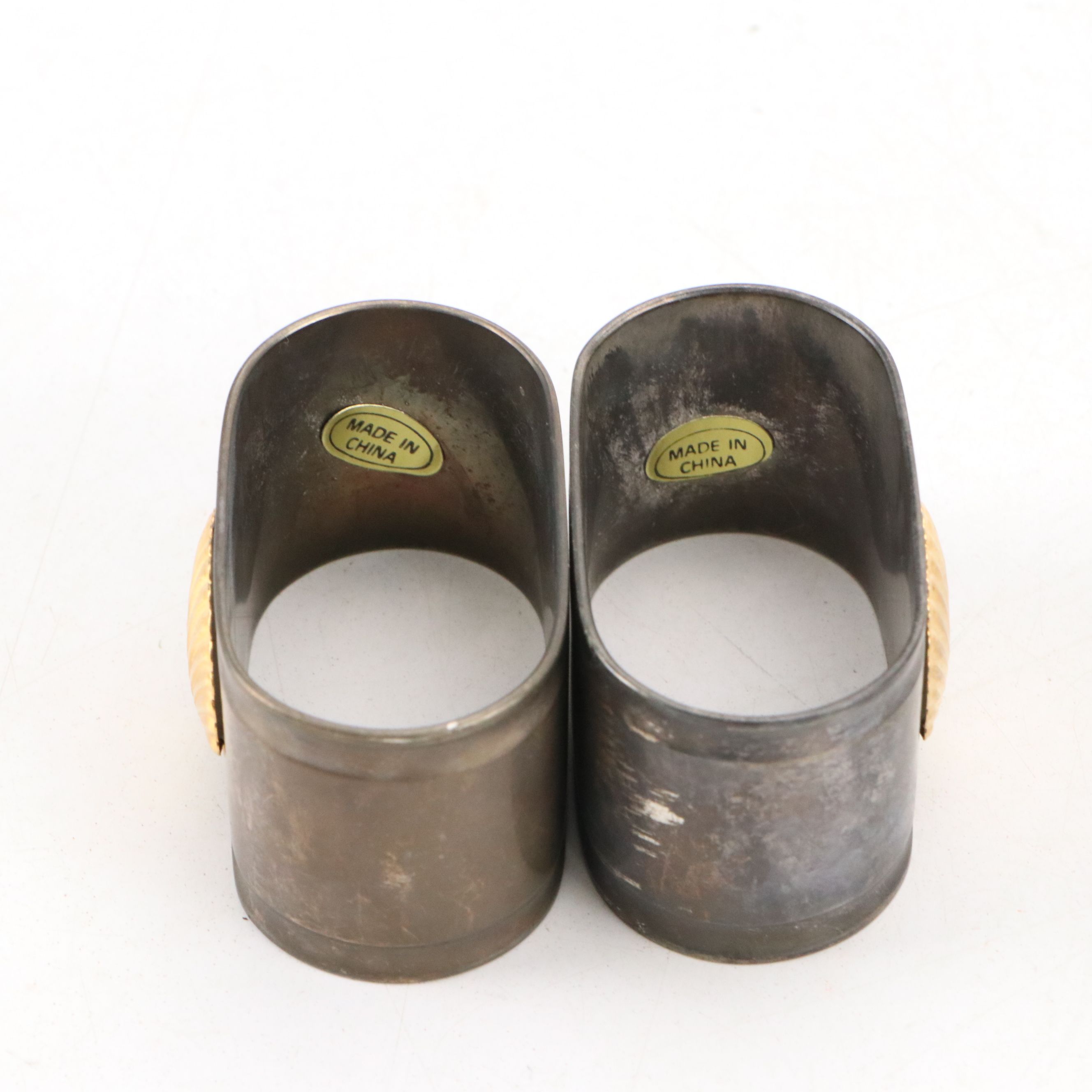 Maltese Cross and Other Napkin Rings with Porcelain Half Doll and Other Decor