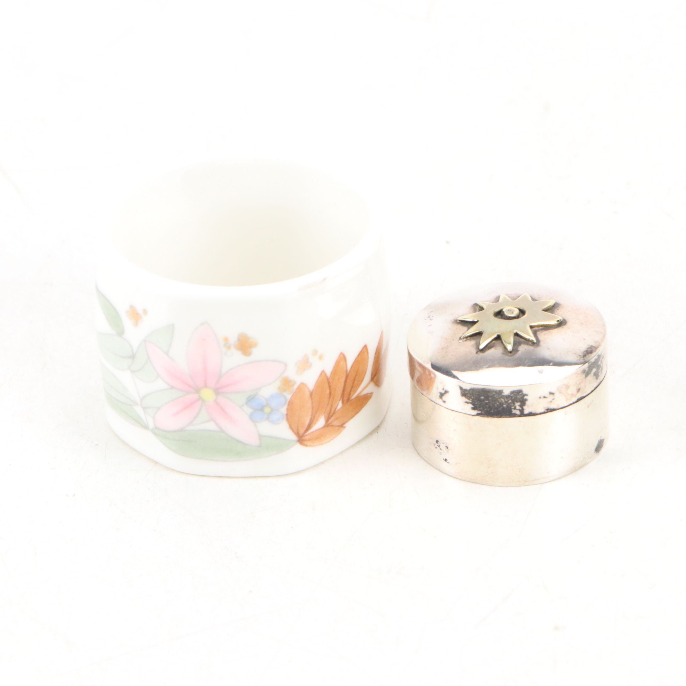 Maltese Cross and Other Napkin Rings with Porcelain Half Doll and Other Decor