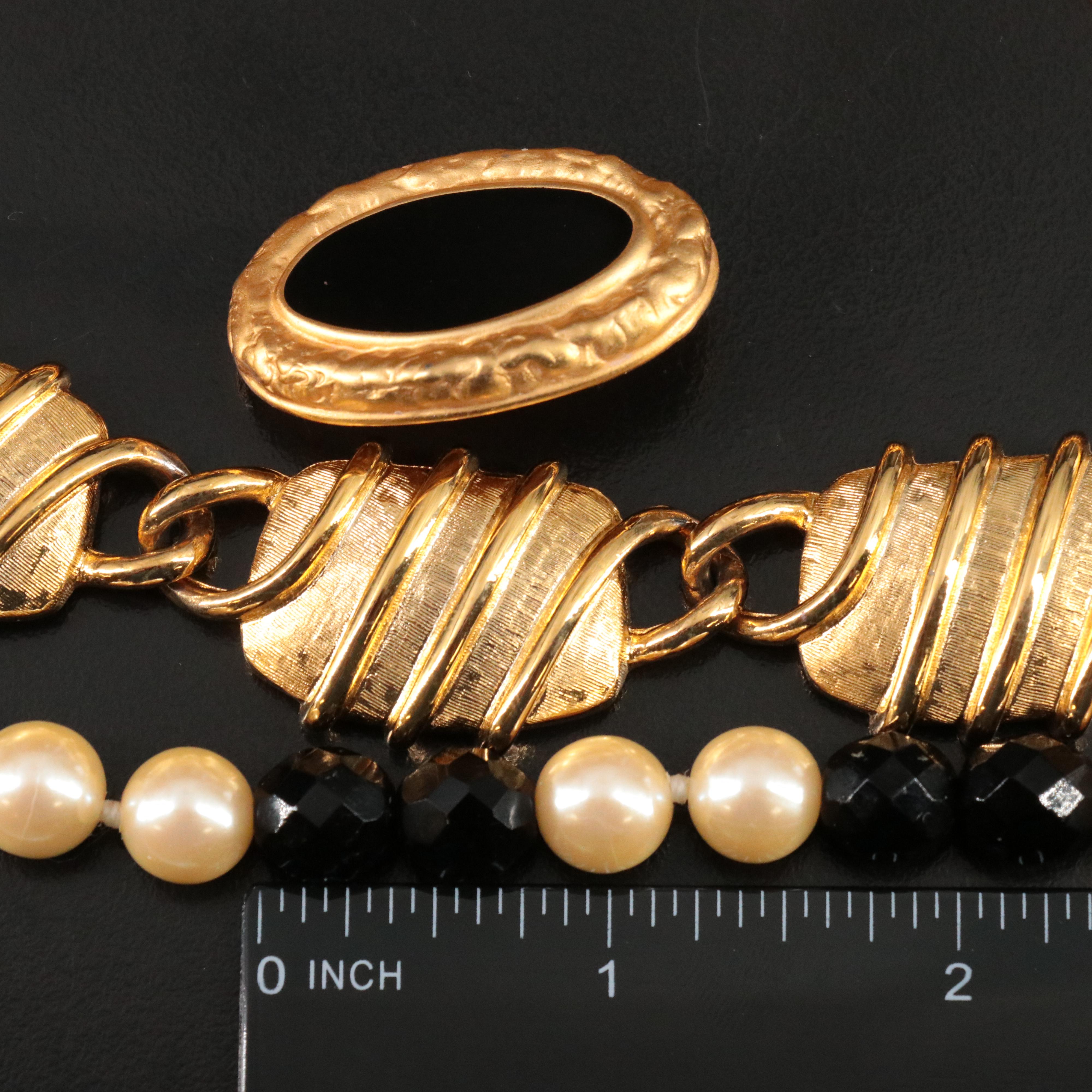 Anne Klein and Kenneth Jay Lane Featured in Black and Gold-Tone Jewelry