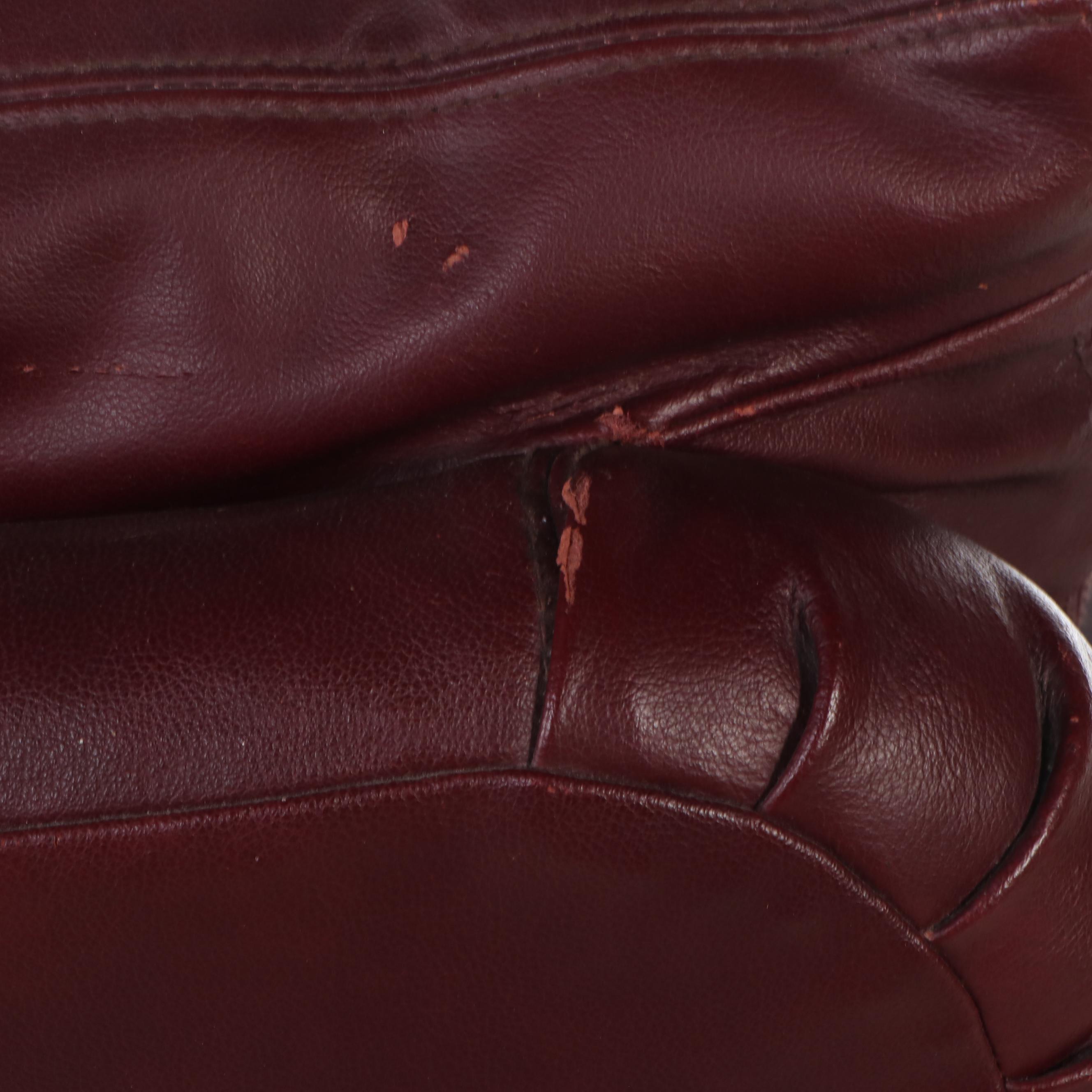 Carved Wood and Leather Sofa